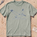 bay heavyweight tee with a single-line gliding pelican graphic.