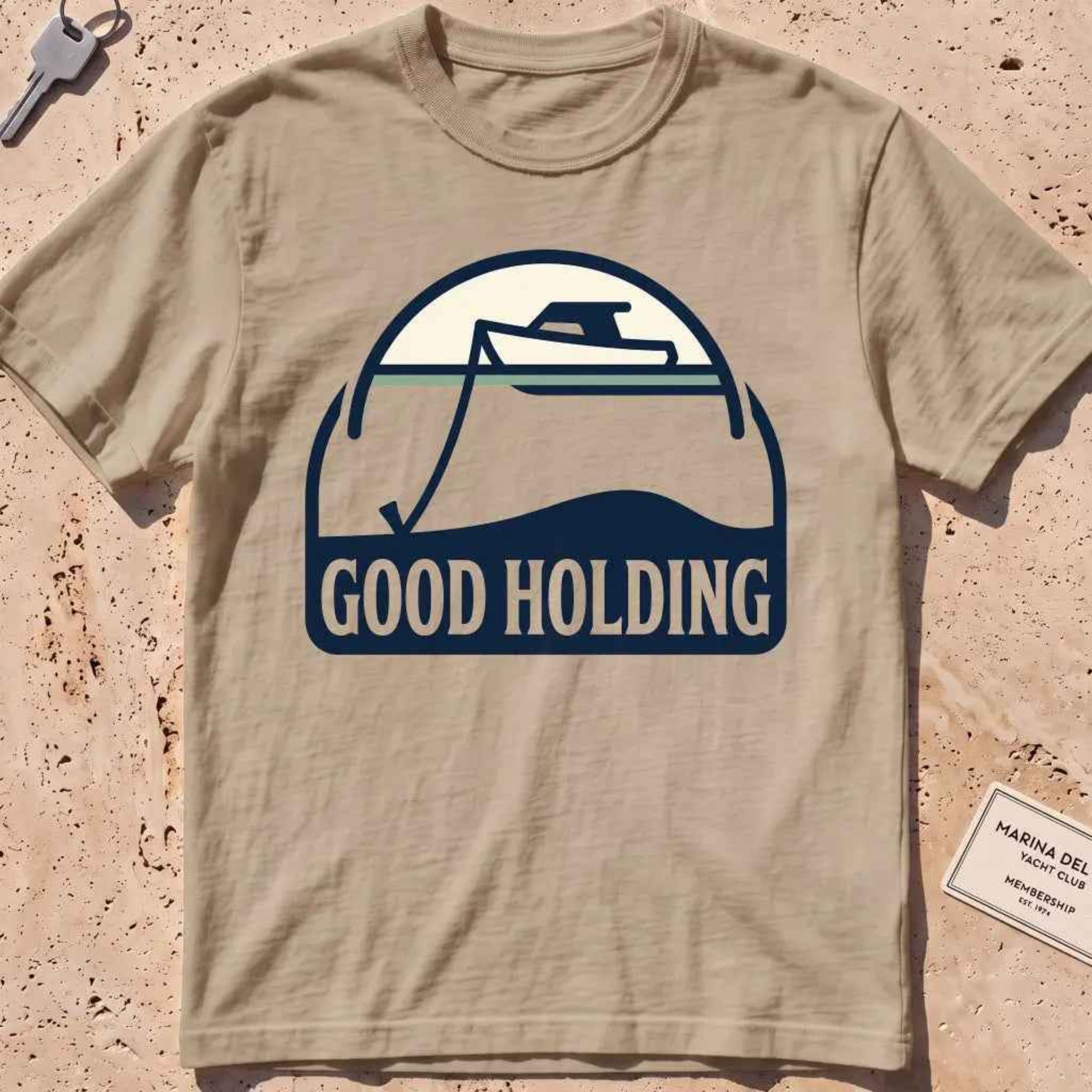 khaki heavyweight tee with a boat and anchor-rode "Good Holding" badge.