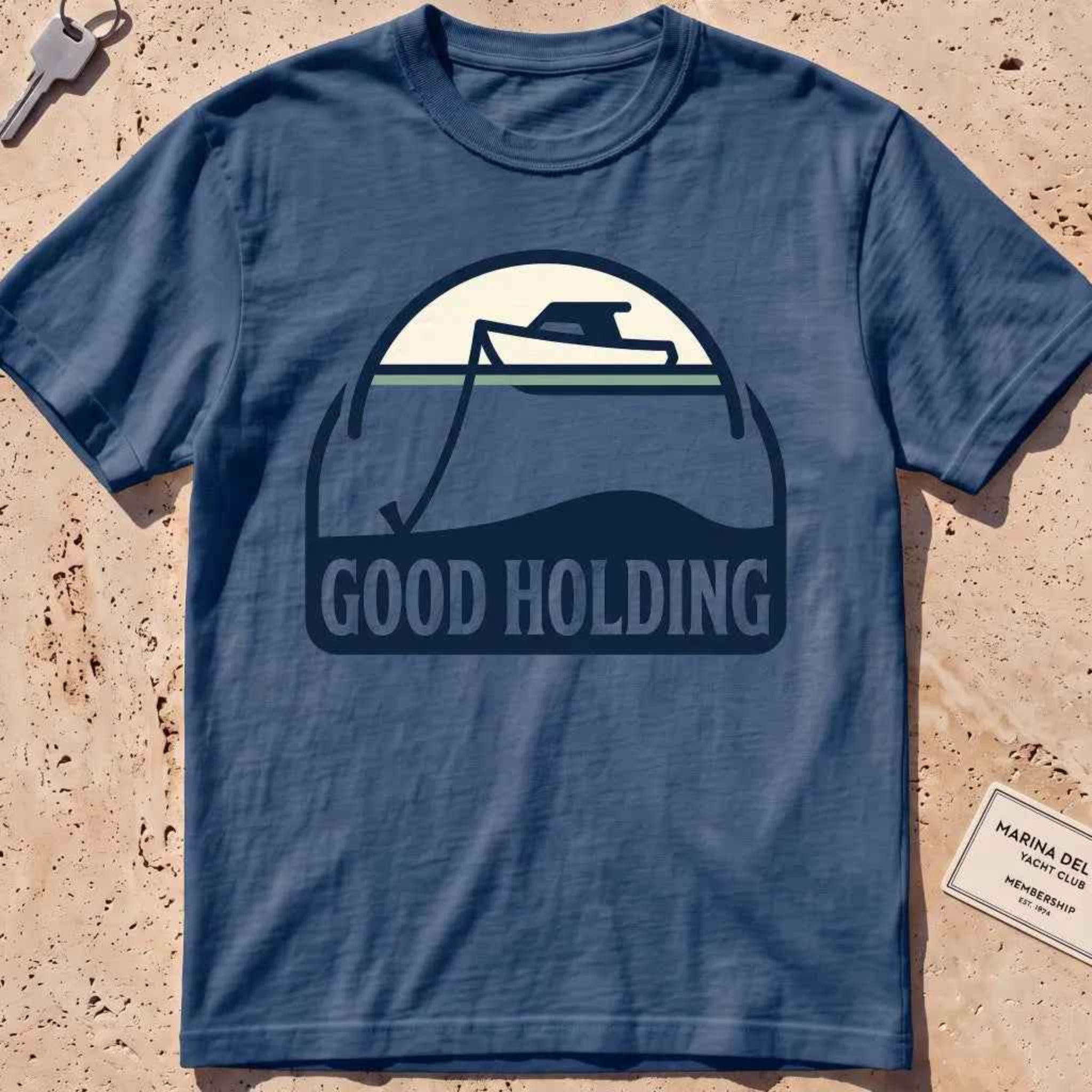 midnight heavyweight tee with a boat and anchor-rode "Good Holding" badge.