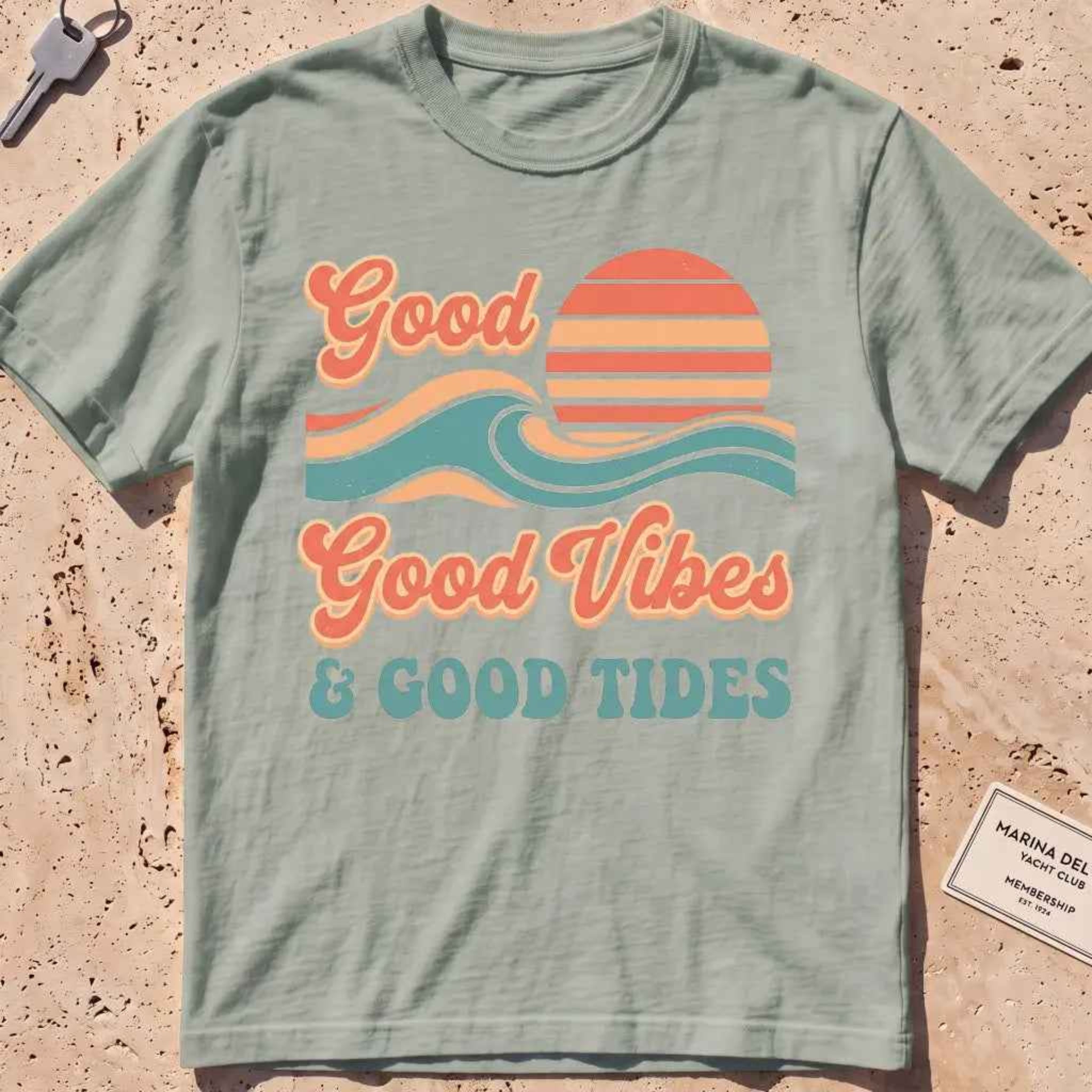 bay heavyweight tee with retro "Good Vibes and Good Tides" sun-and-wave script.