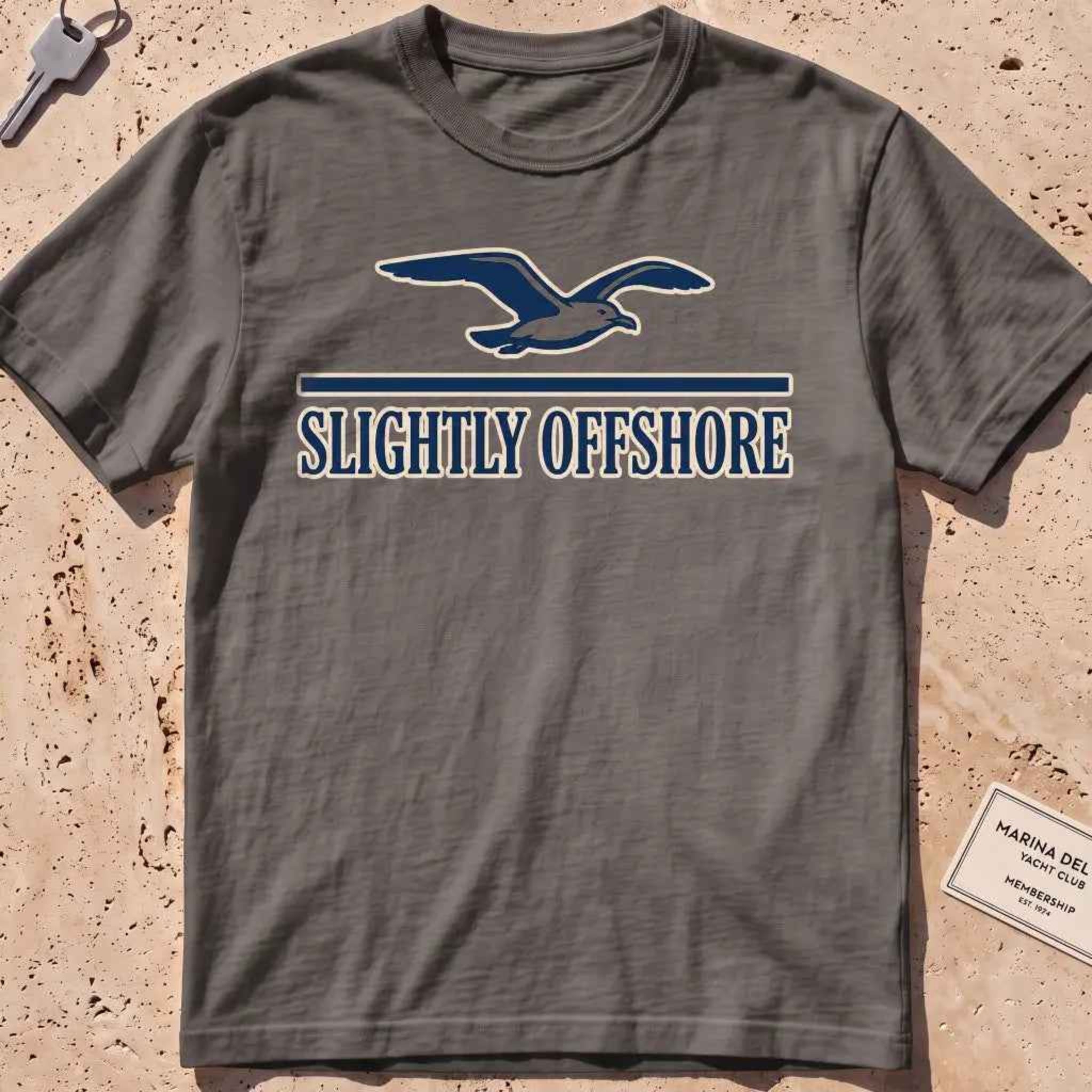 pepper heavyweight tee with a gliding gull over a small wordmark graphic.