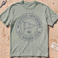 bay heavyweight tee with an engraved burgee and compass-seal crest.