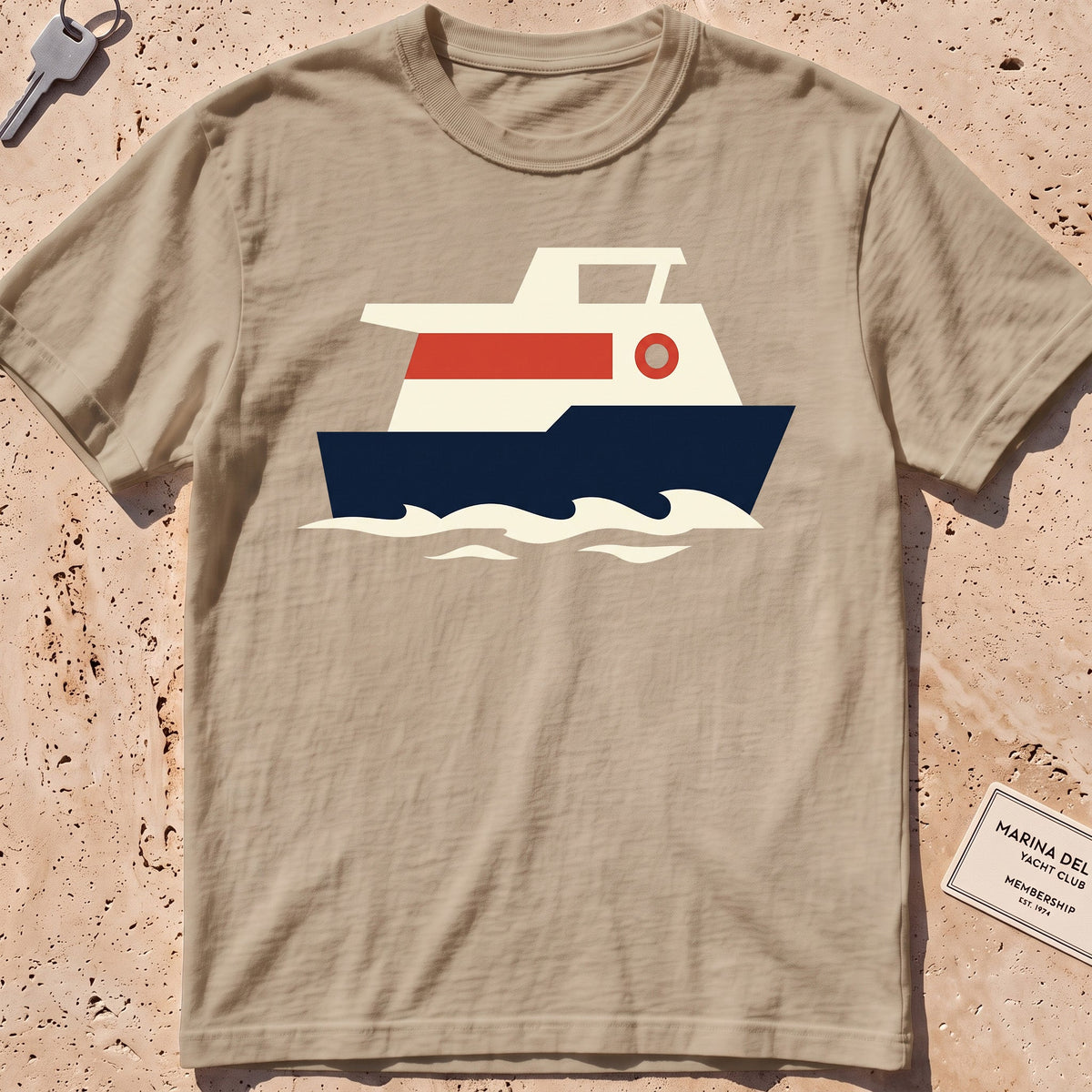 khaki heavyweight tee with a flat-geometric harbour ferry graphic.