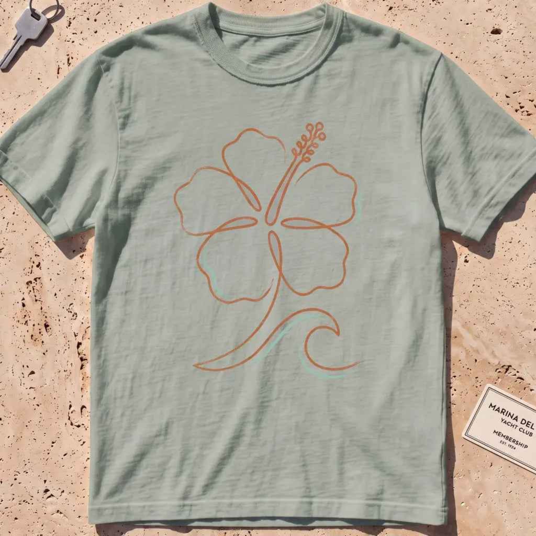 bay heavyweight tee with a single-line hibiscus and small wave graphic.