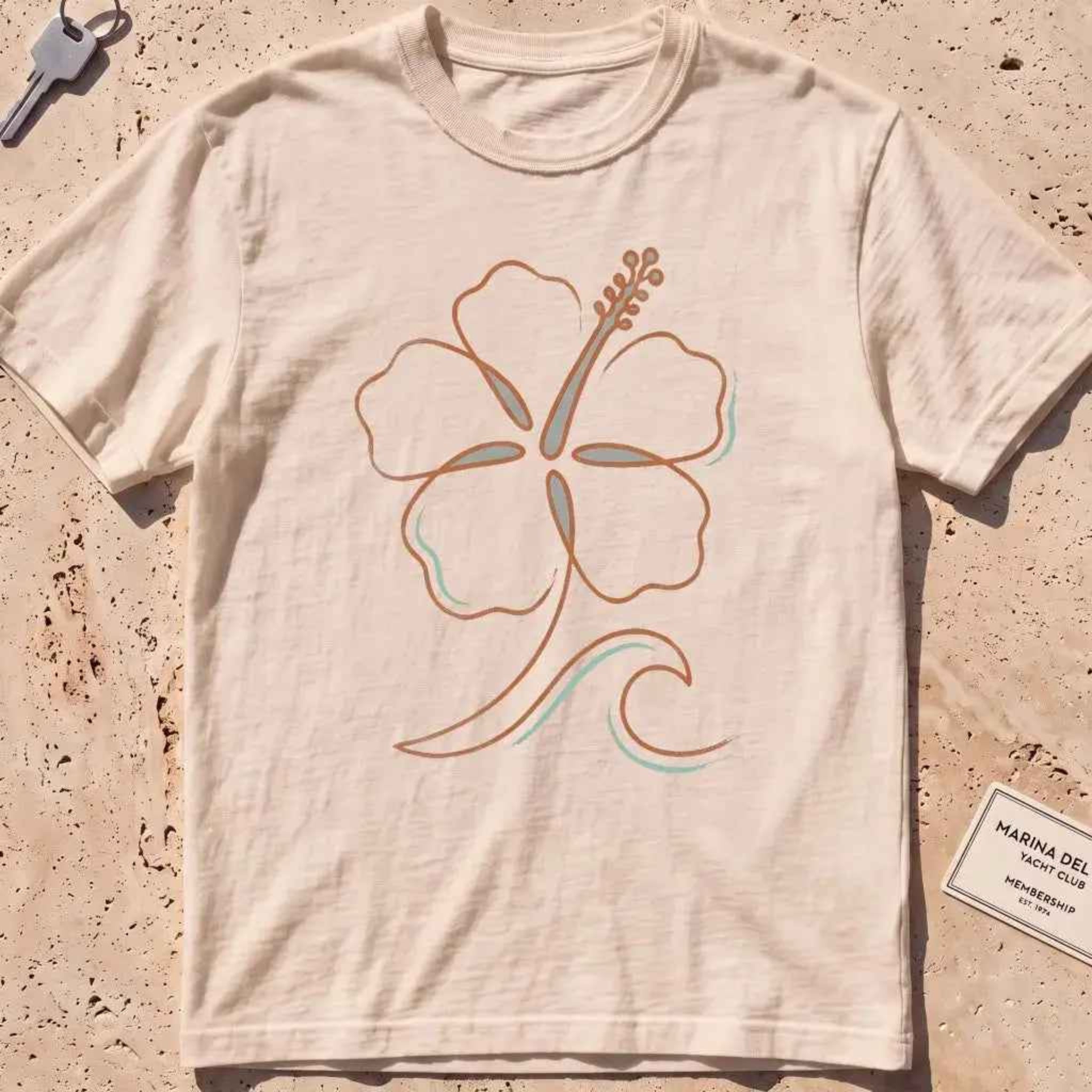 ivory heavyweight tee with a single-line hibiscus and small wave graphic.