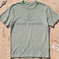 bay heavyweight tee with a minimal anchor and "Home Waters" wordmark.