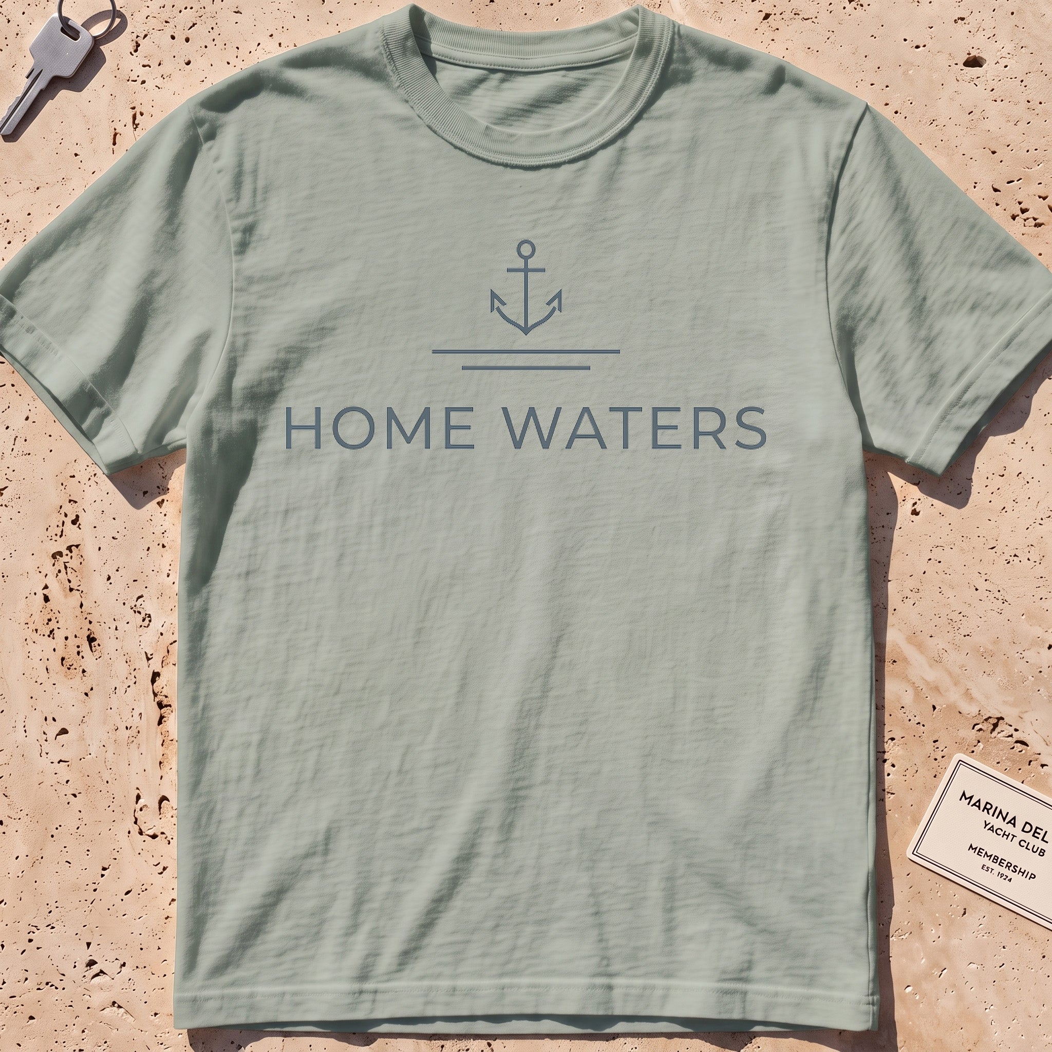 bay heavyweight tee with a minimal anchor and "Home Waters" wordmark.