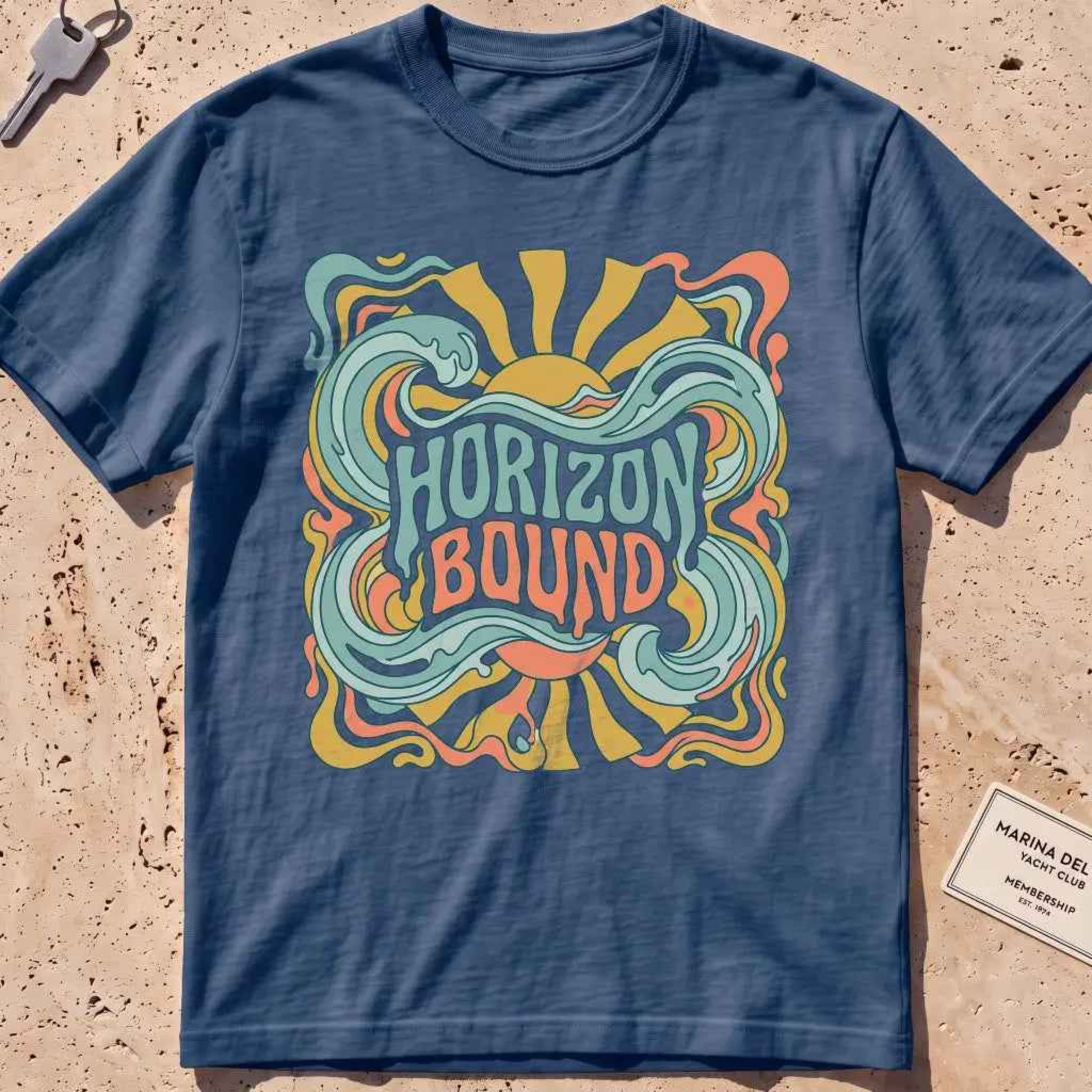 midnight heavyweight tee with retro "Horizon Bound" lettering over waves.