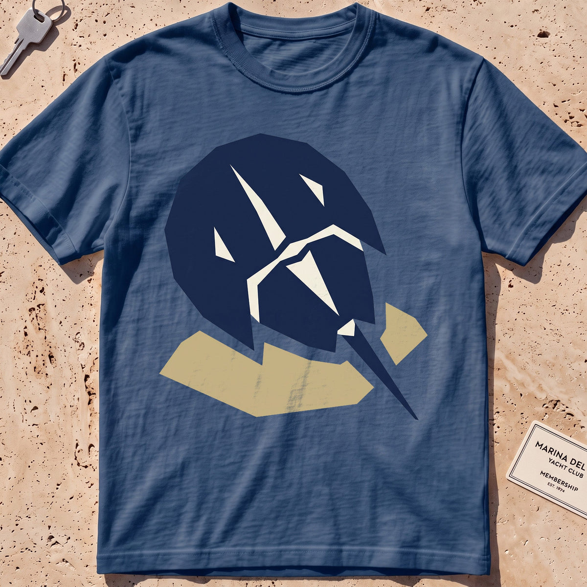 midnight heavyweight tee with a flat-geometric horseshoe crab graphic.