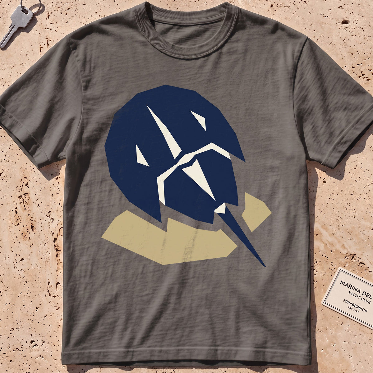 pepper heavyweight tee with a flat-geometric horseshoe crab graphic.