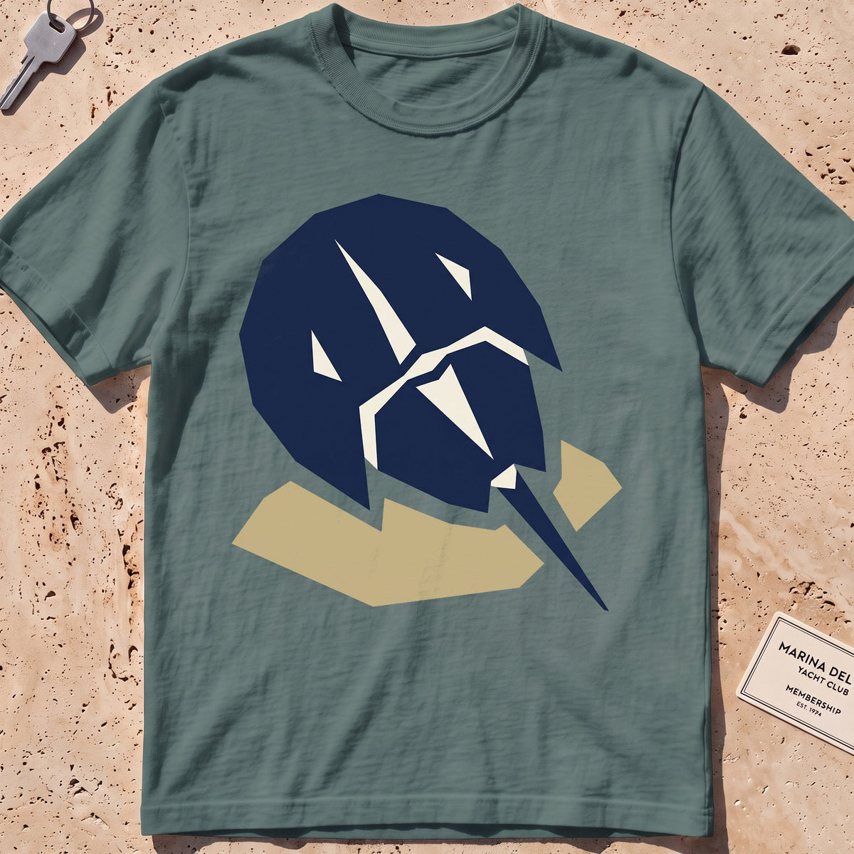 blue spruce heavyweight tee with a flat-geometric horseshoe crab graphic.