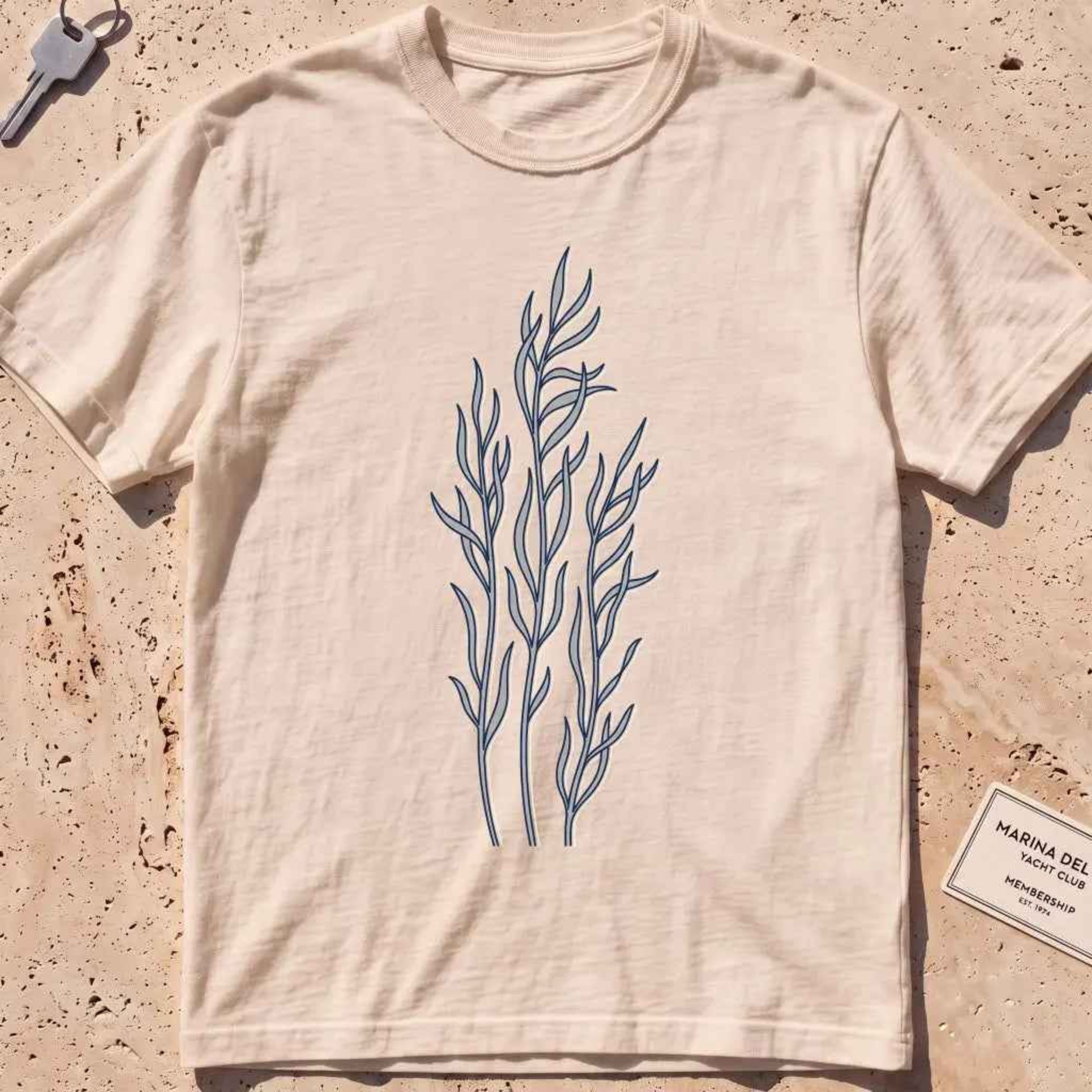 ivory heavyweight tee with minimal-line drifting kelp strands graphic.