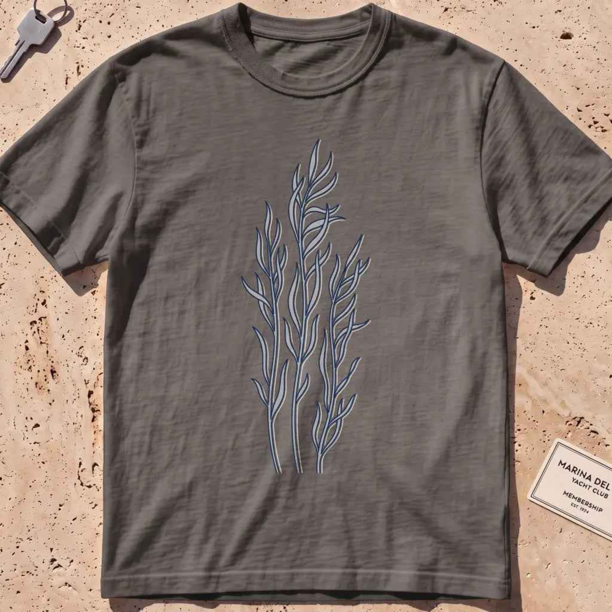 pepper heavyweight tee with minimal-line drifting kelp strands graphic.