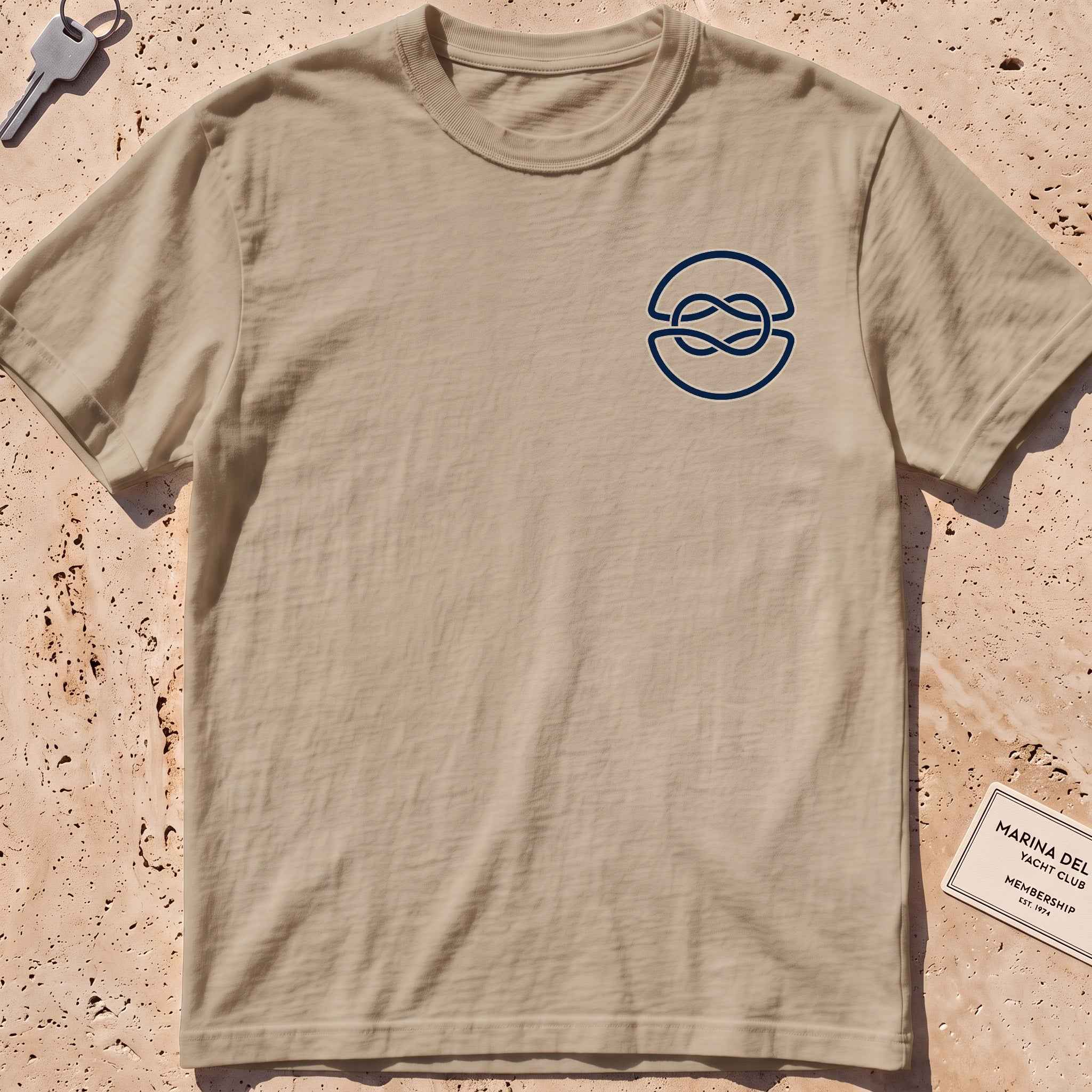 khaki heavyweight tee with a clean overhand-knot crest graphic.