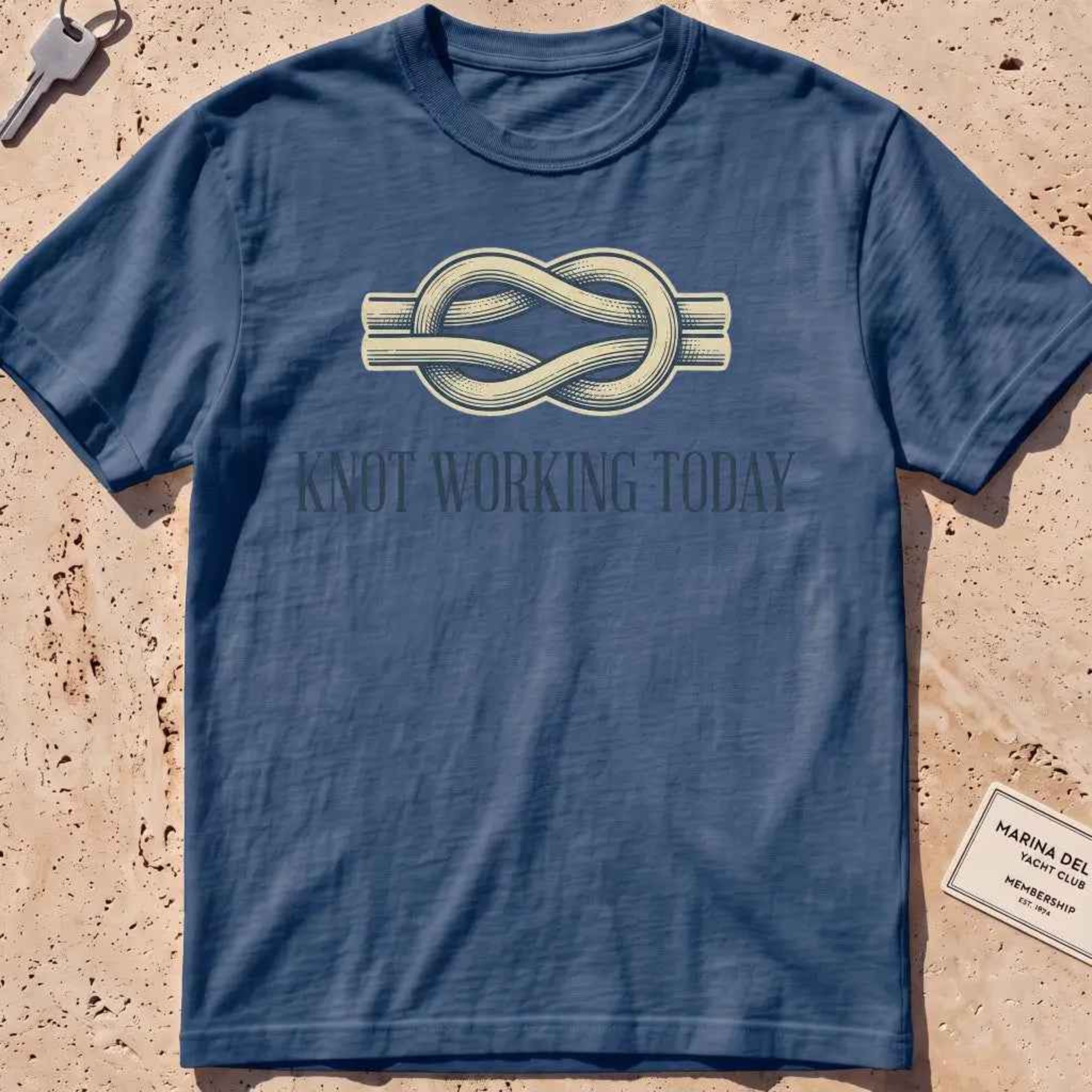 midnight heavyweight tee with an engraved knot and "Knot Working Today" text.