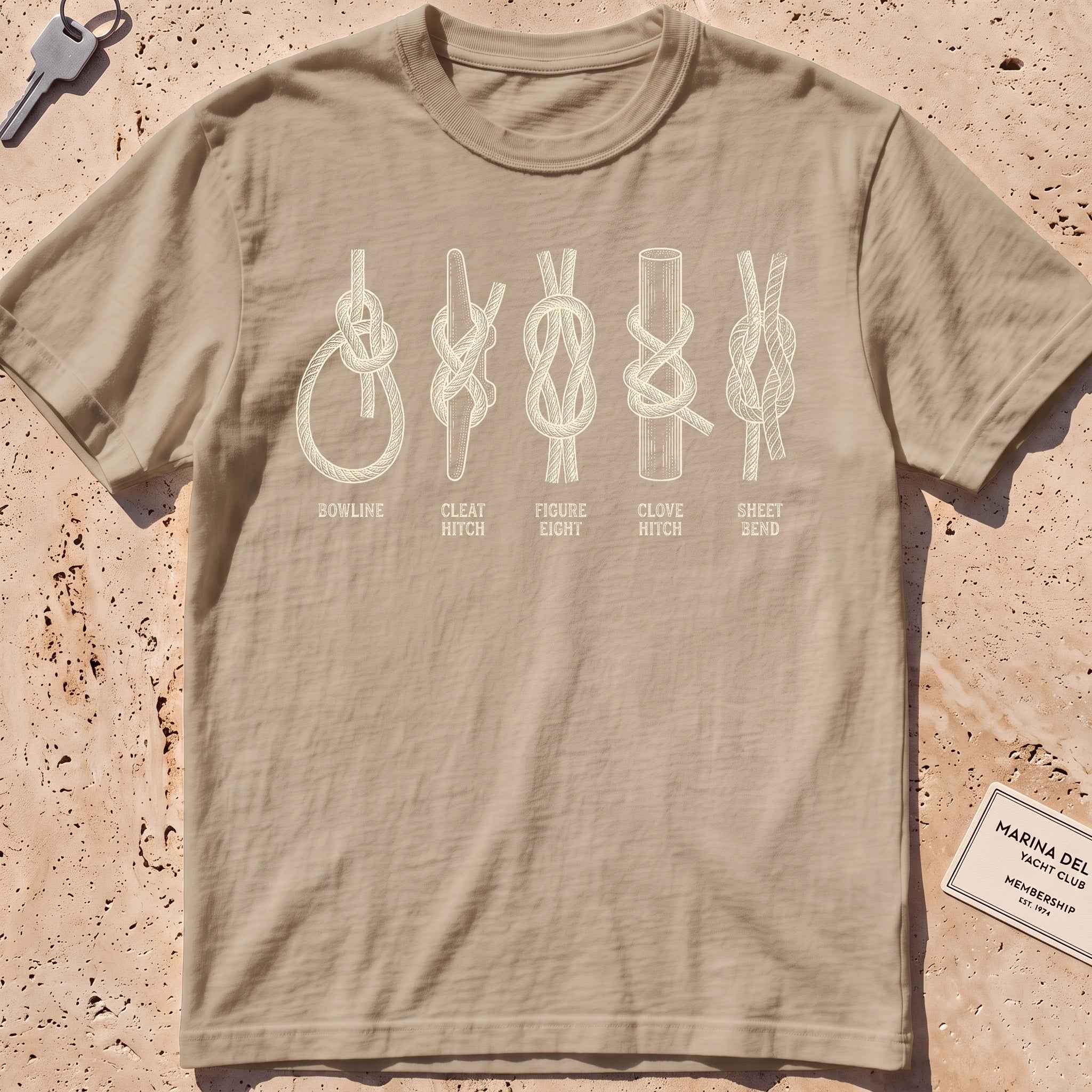 khaki heavyweight tee with an etched chart of sailing knots graphic.