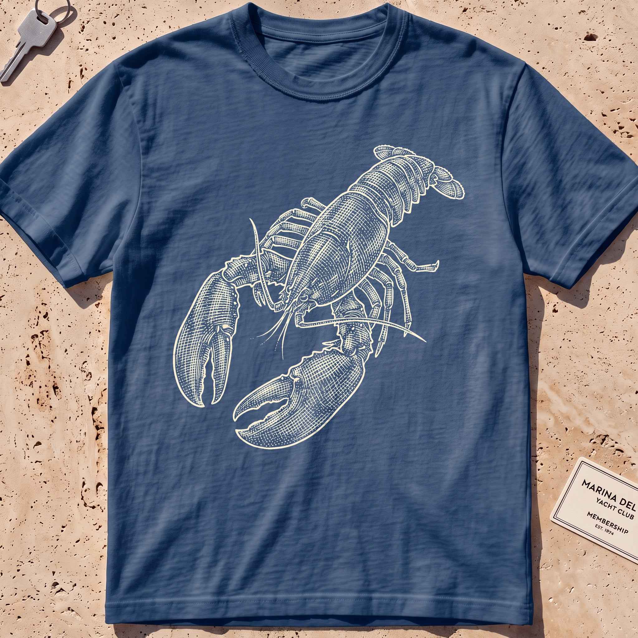 midnight heavyweight tee with a finely etched whole lobster graphic.
