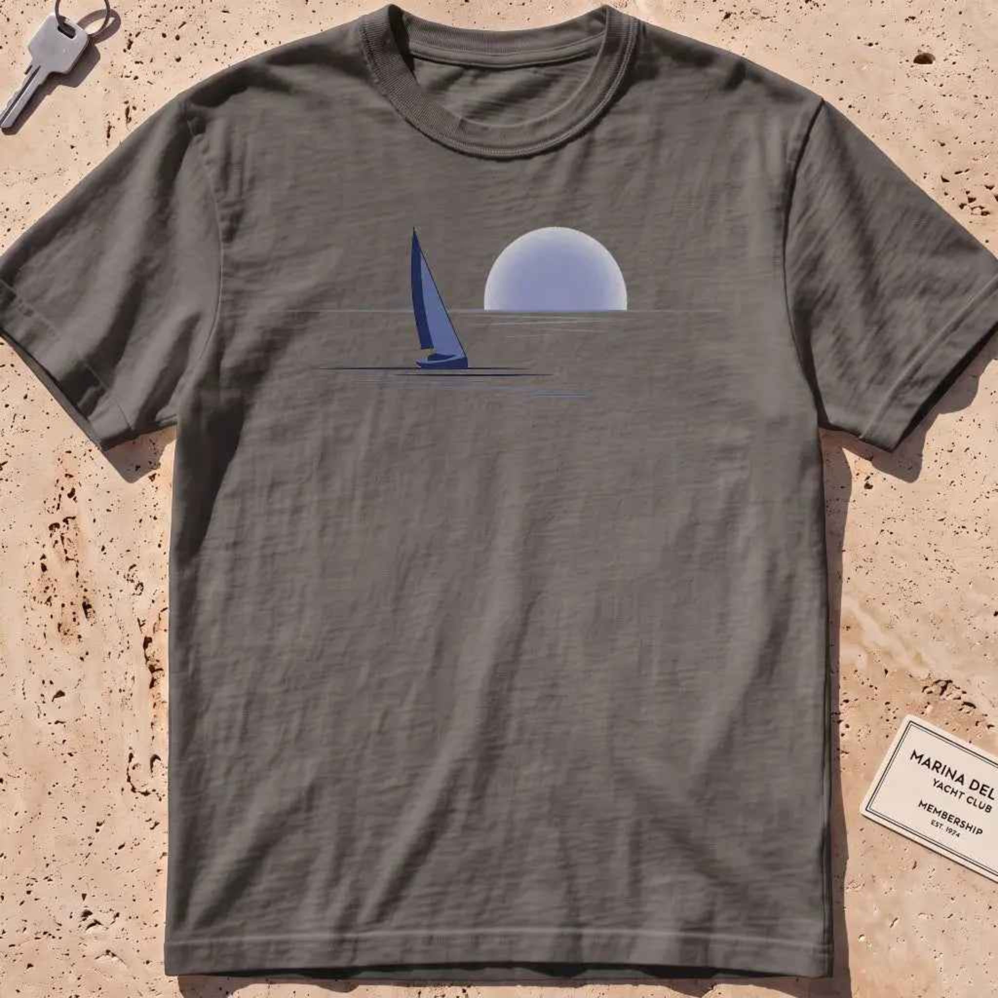 pepper heavyweight tee with a lone sail against a rising sun in minimal style.
