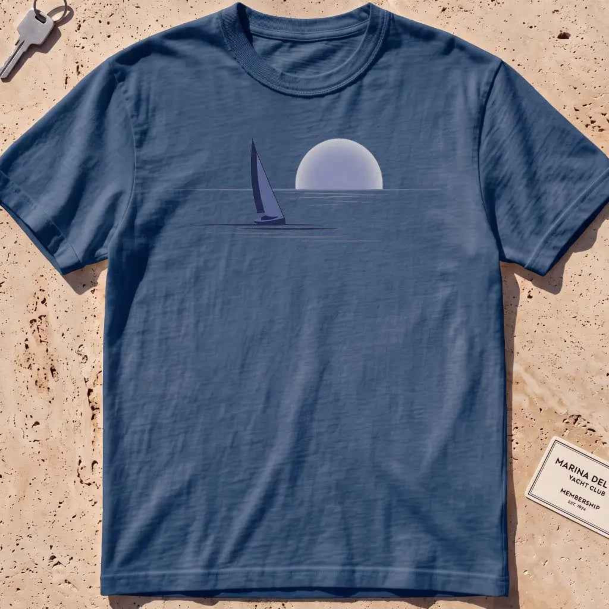 midnight heavyweight tee with a lone sail against a rising sun in minimal style.