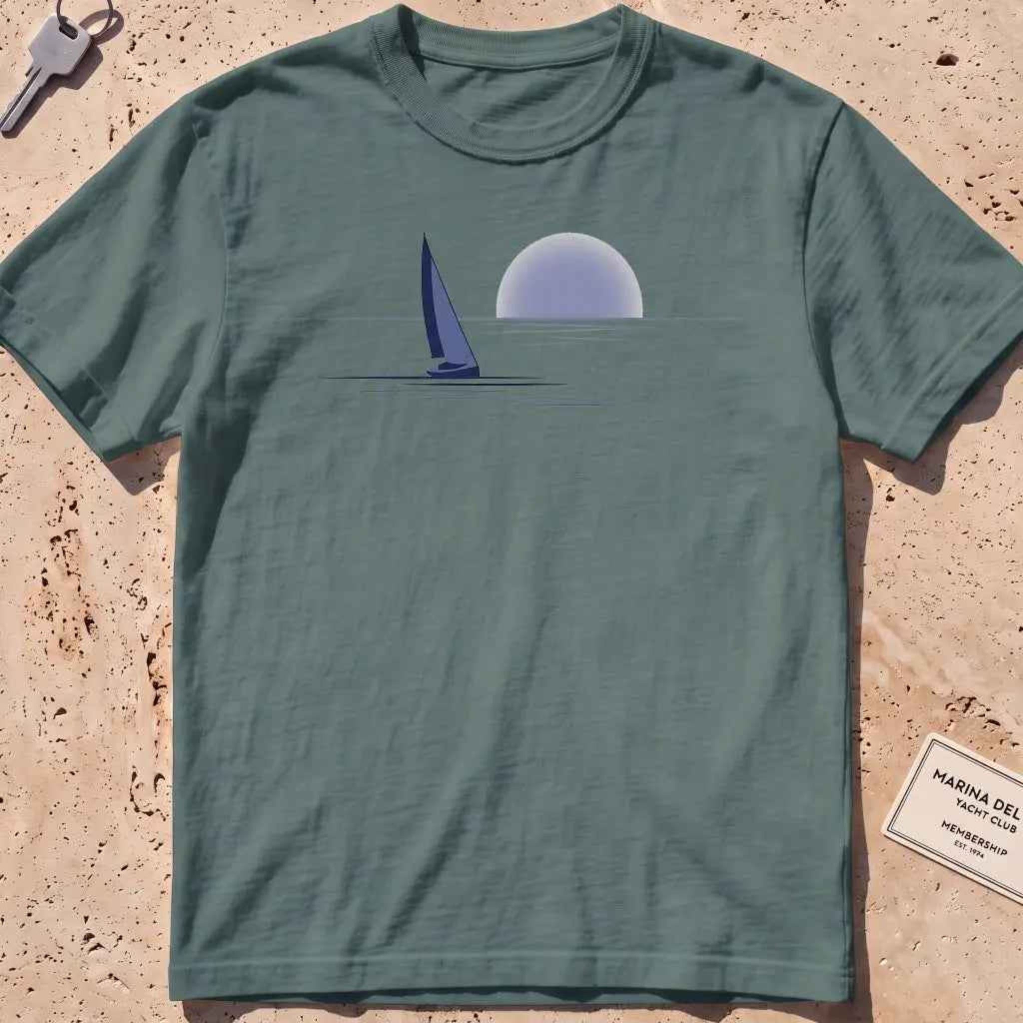 blue spruce heavyweight tee with a lone sail against a rising sun in minimal style.