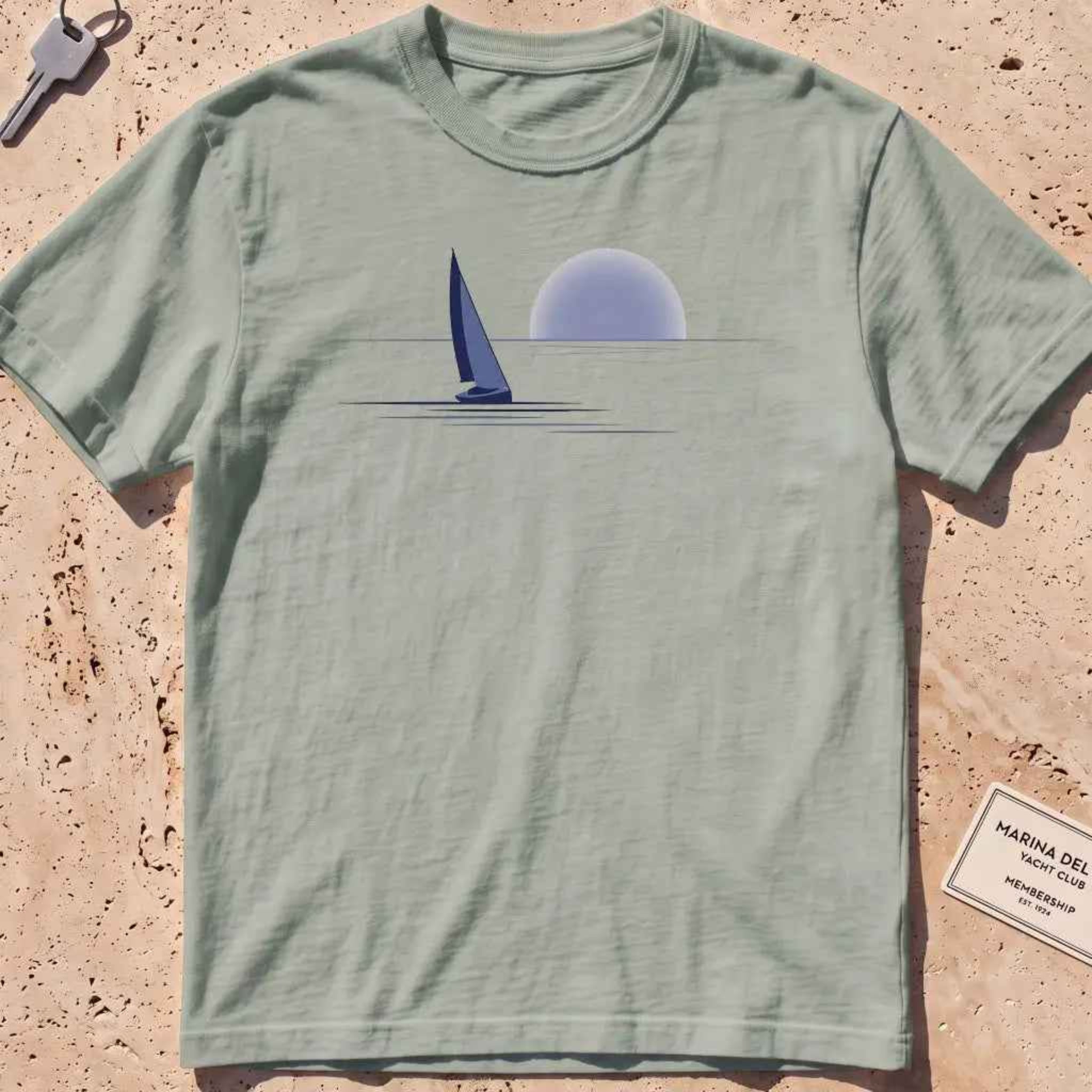 bay heavyweight tee with a lone sail against a rising sun in minimal style.
