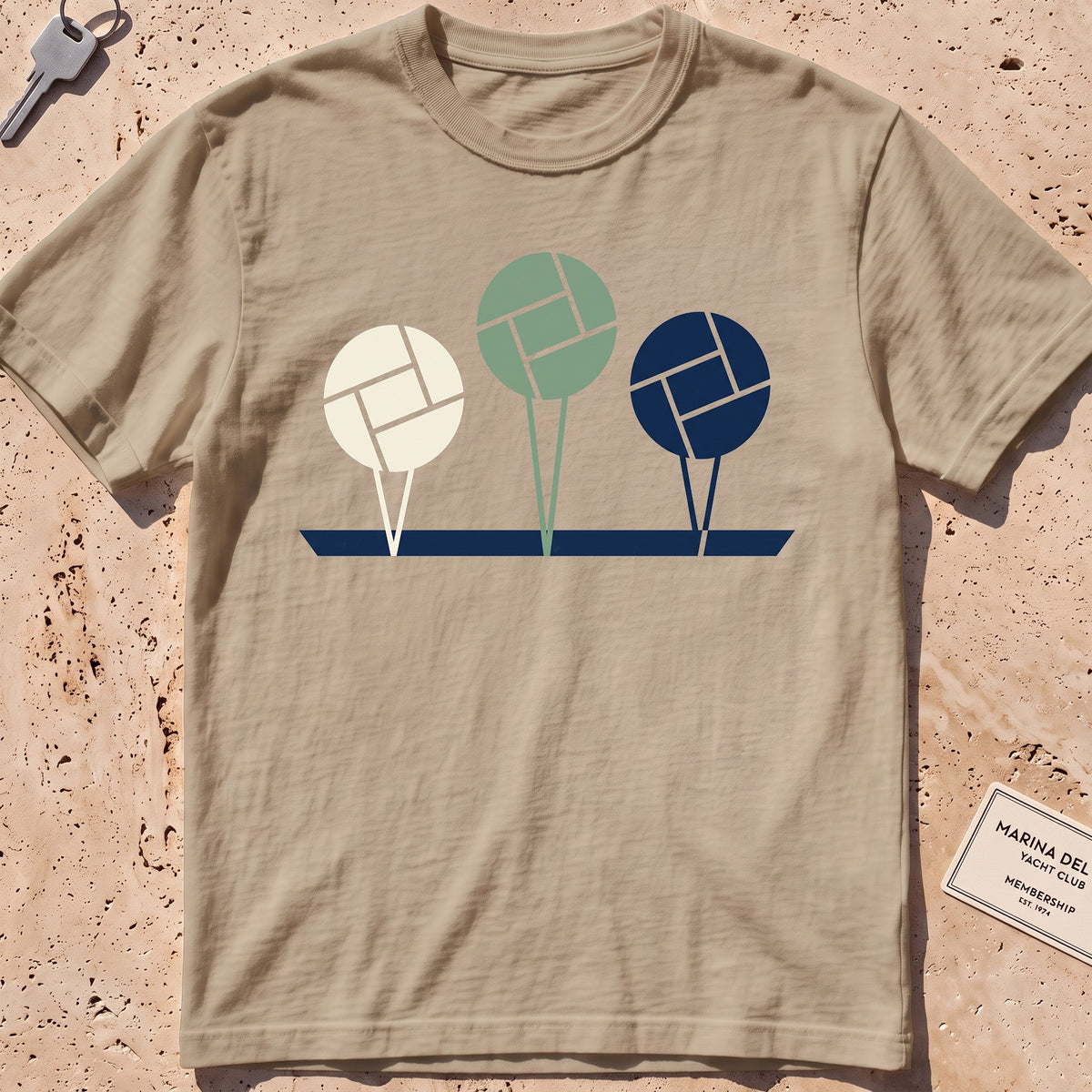 khaki heavyweight tee with flat-geometric mooring balls graphic.