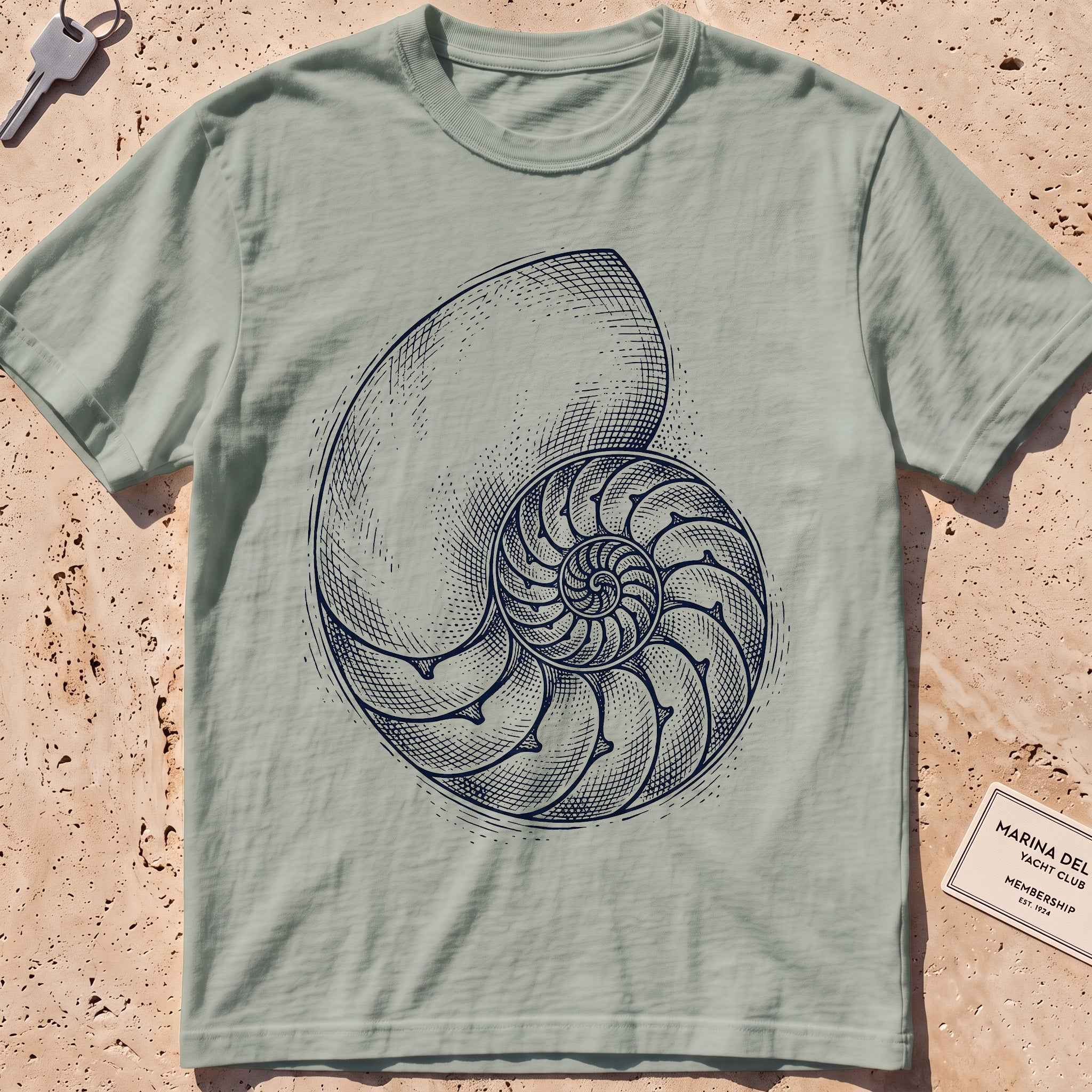 bay heavyweight tee with an etched nautilus shell graphic.