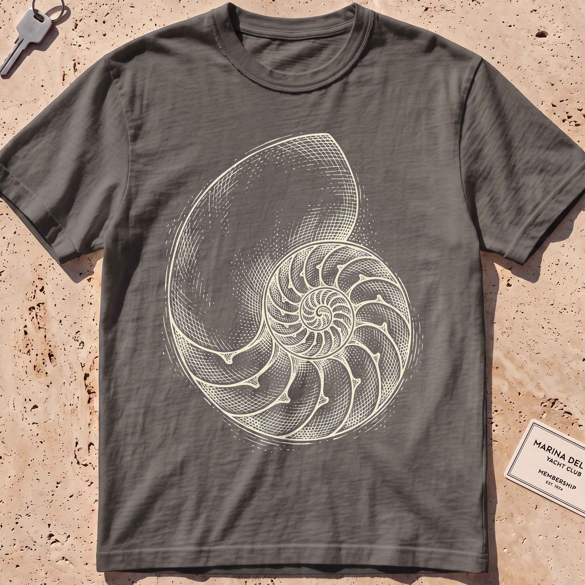 pepper heavyweight tee with an etched nautilus shell graphic.