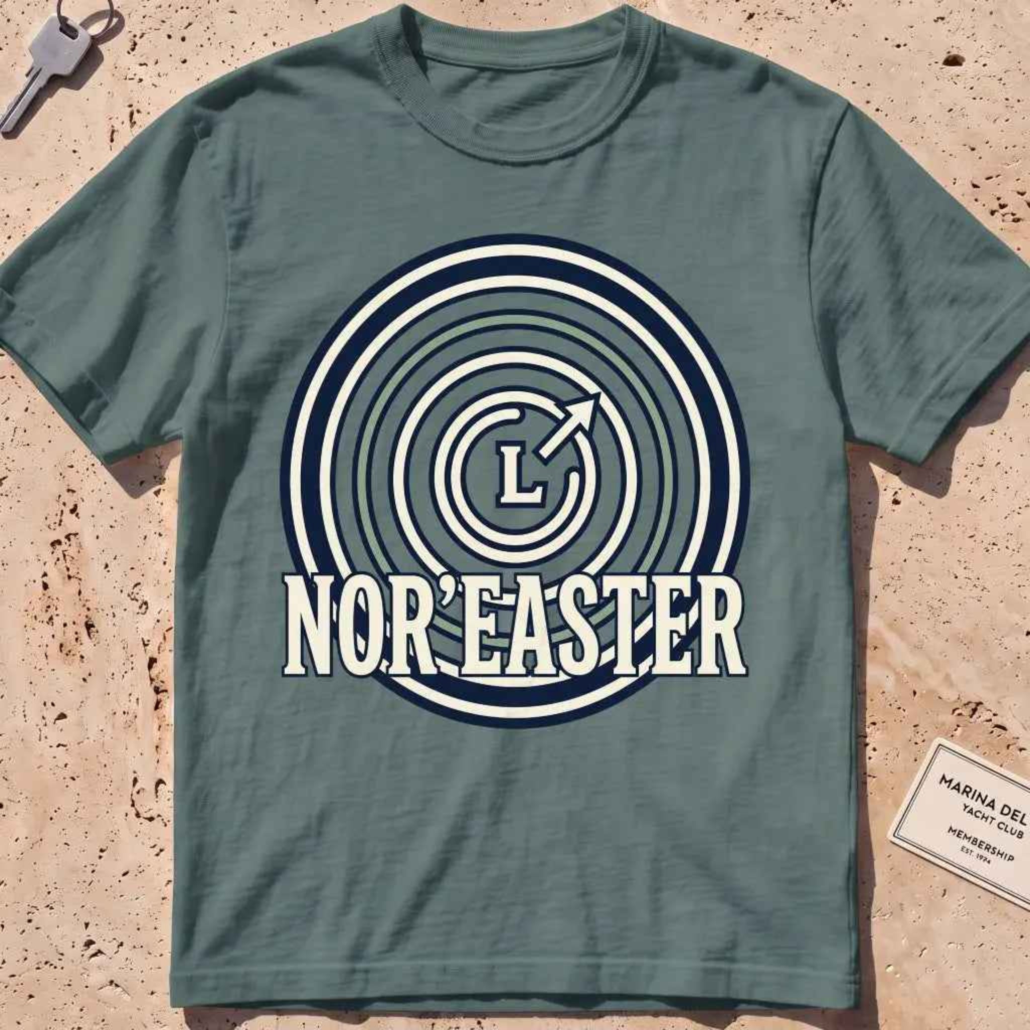 blue spruce heavyweight tee with an isobar weather-map "Nor'easter" badge.