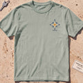 bay heavyweight tee with a compass-star "North Star" crest graphic.