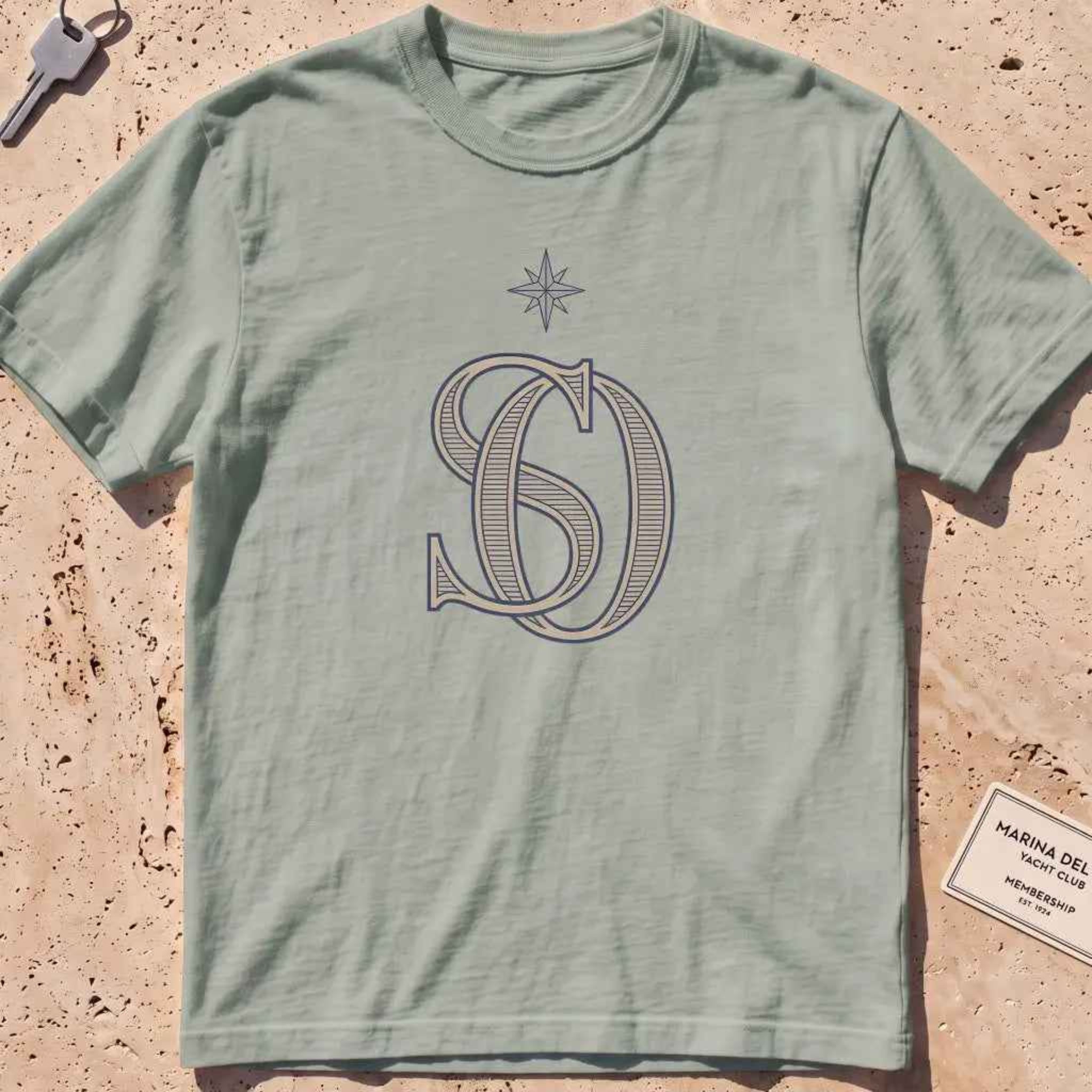 bay heavyweight tee with an interlocking SO monogram and compass star.
