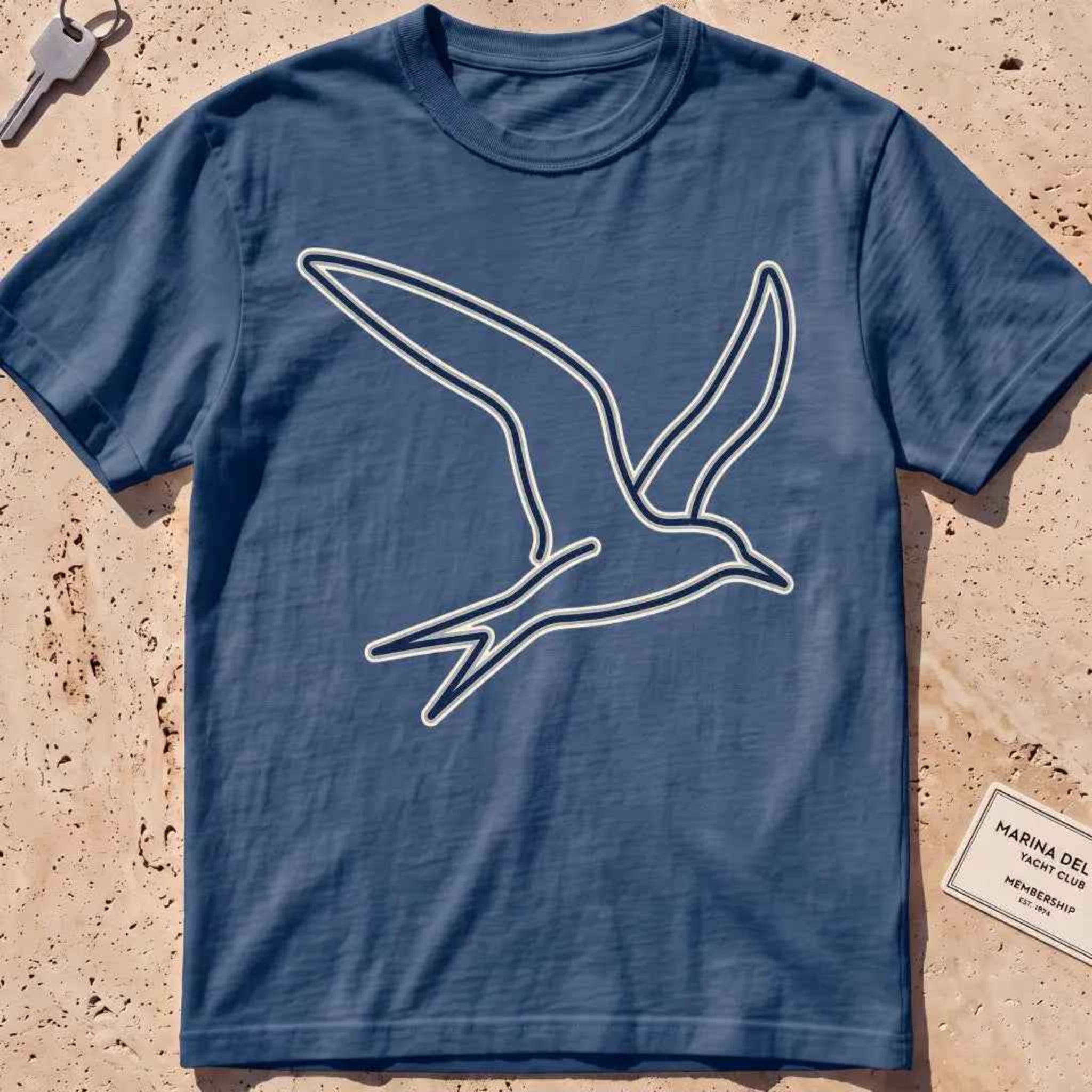midnight heavyweight tee with a wordless continuous-line tern in flight.