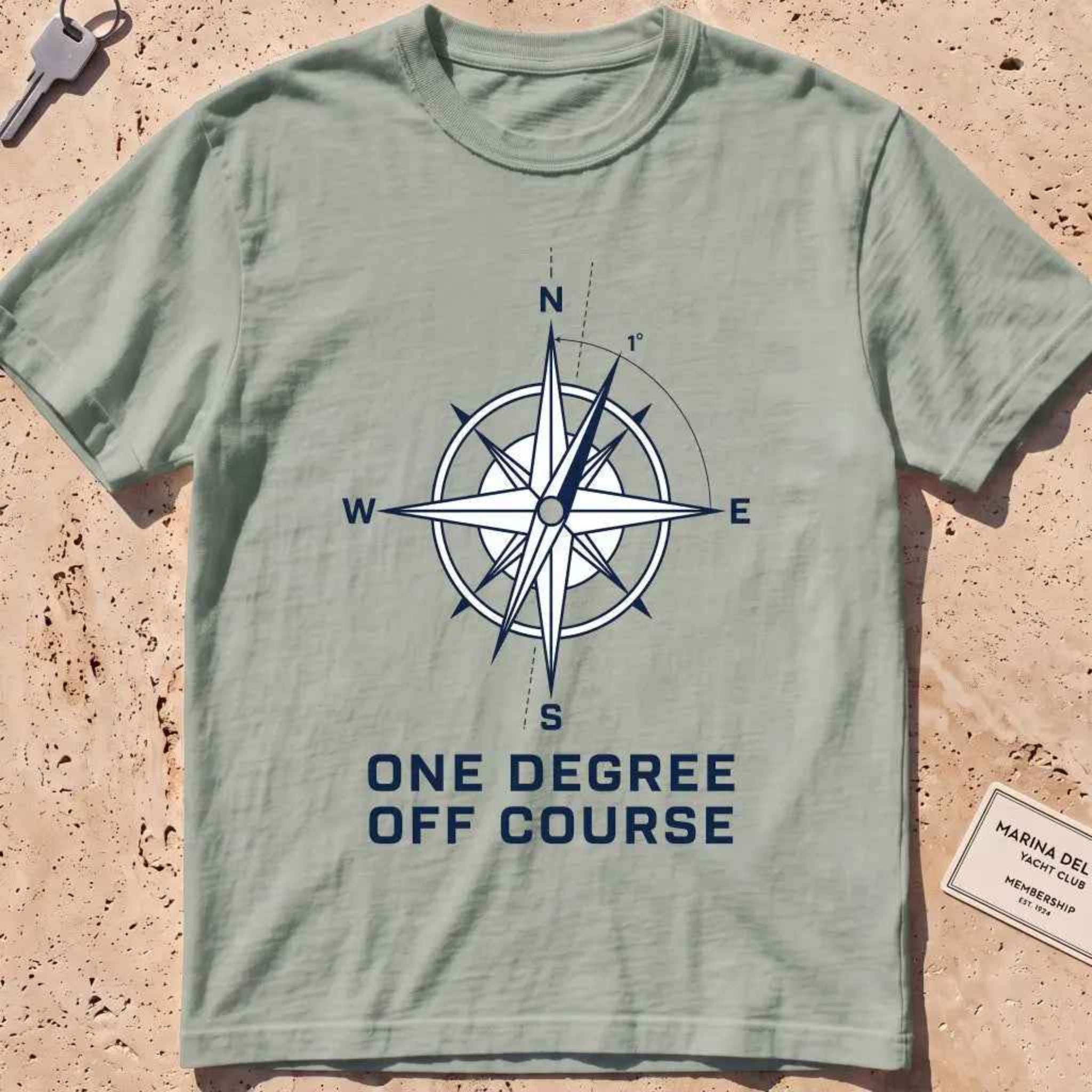 bay heavyweight tee with a compass rose "One Degree Off Course" graphic.