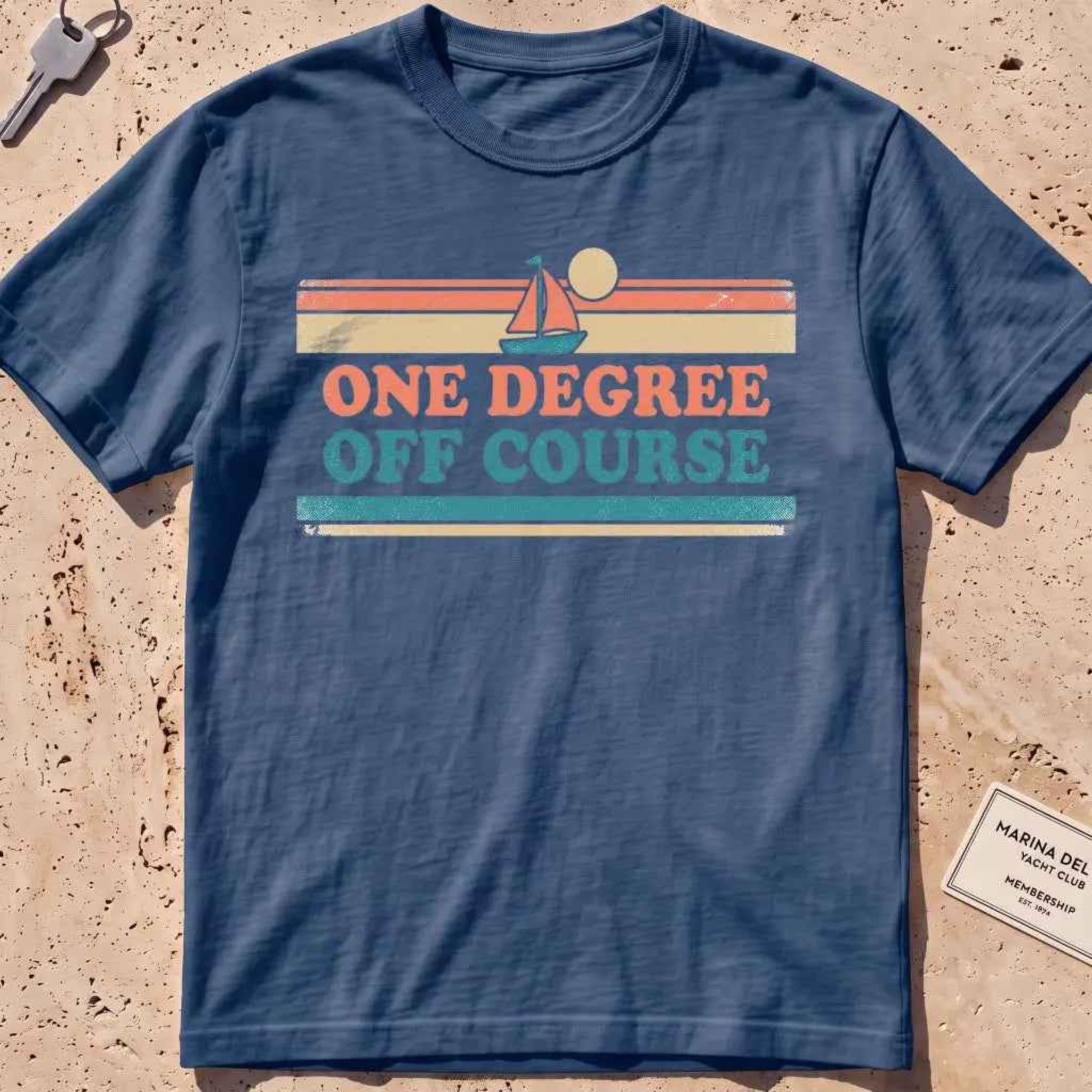 midnight heavyweight tee with retro stripes and "One Degree Off Course" text.