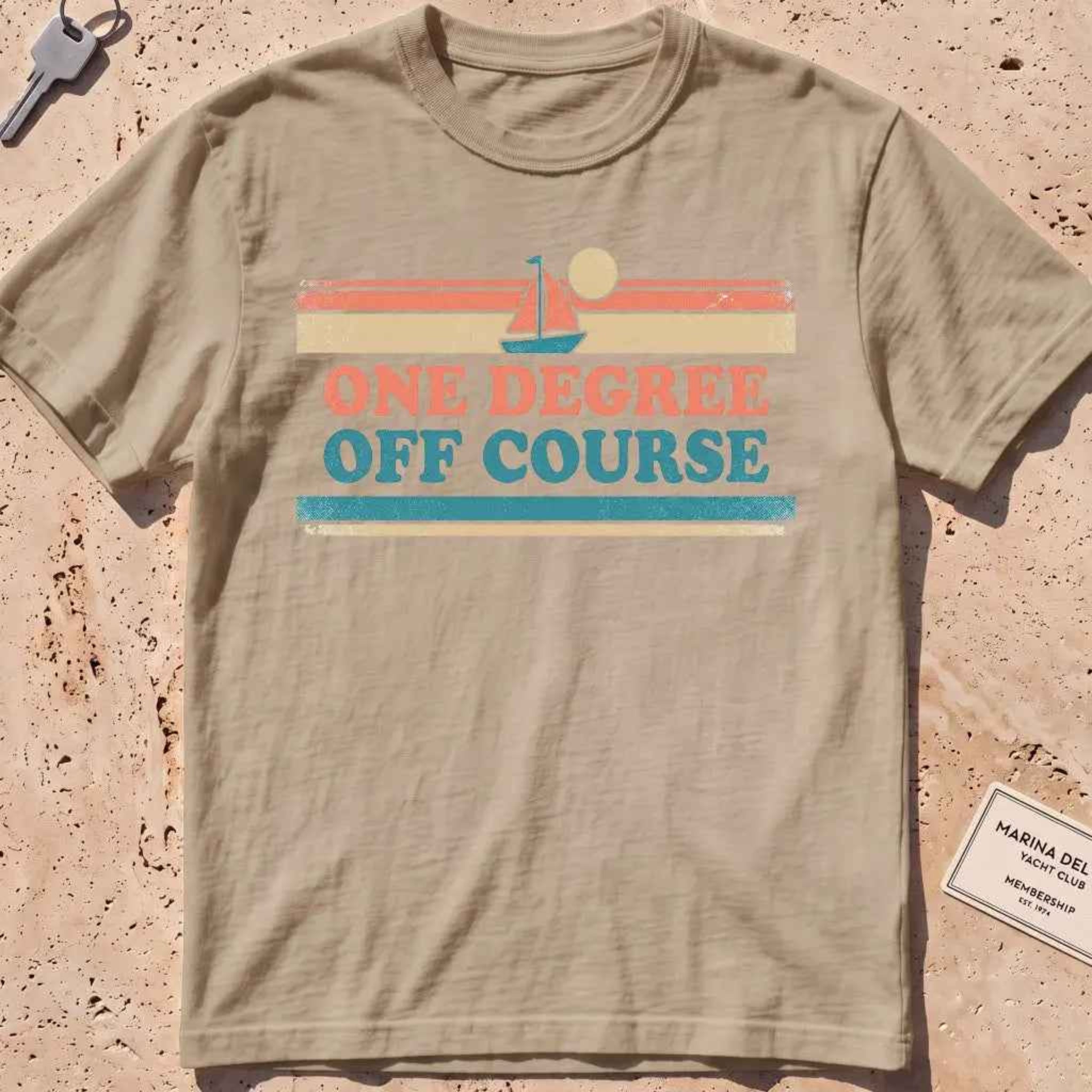 khaki heavyweight tee with retro stripes and "One Degree Off Course" text.