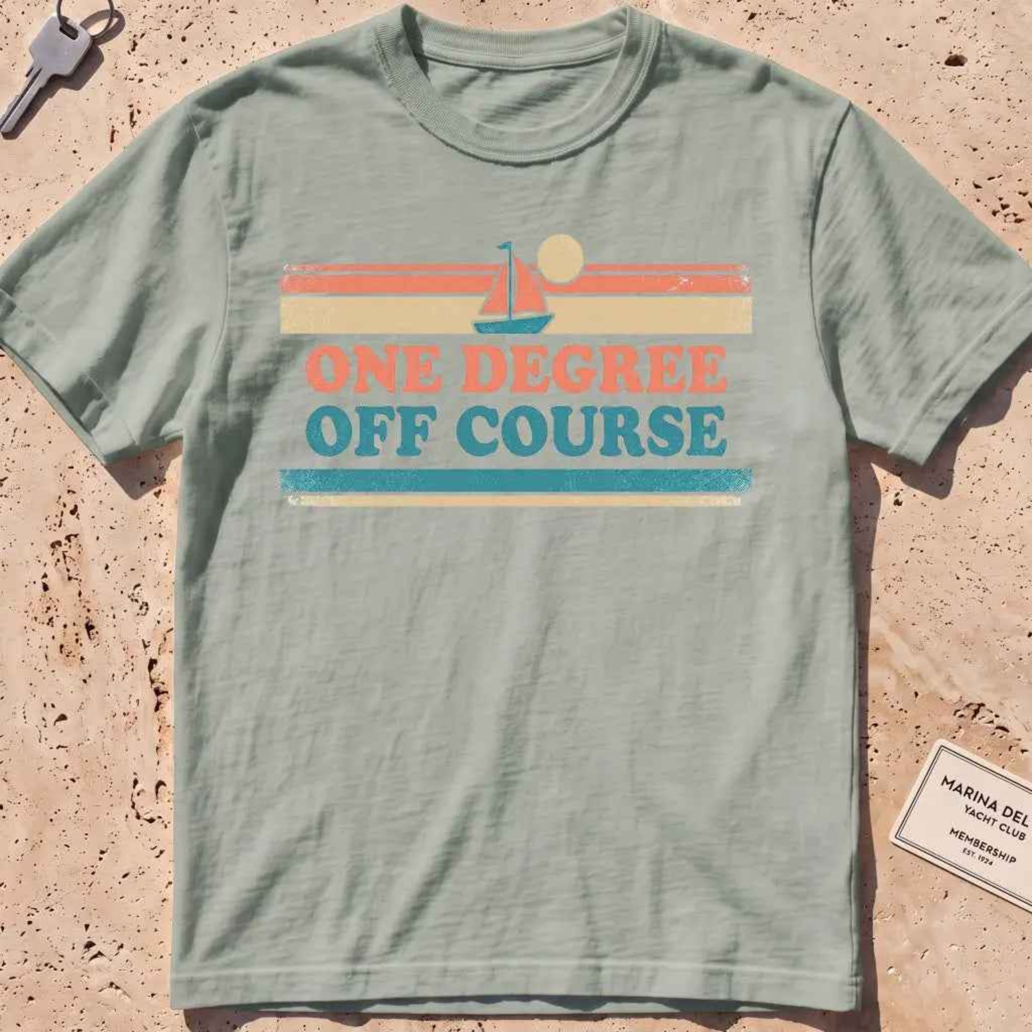 bay heavyweight tee with retro stripes and "One Degree Off Course" text.