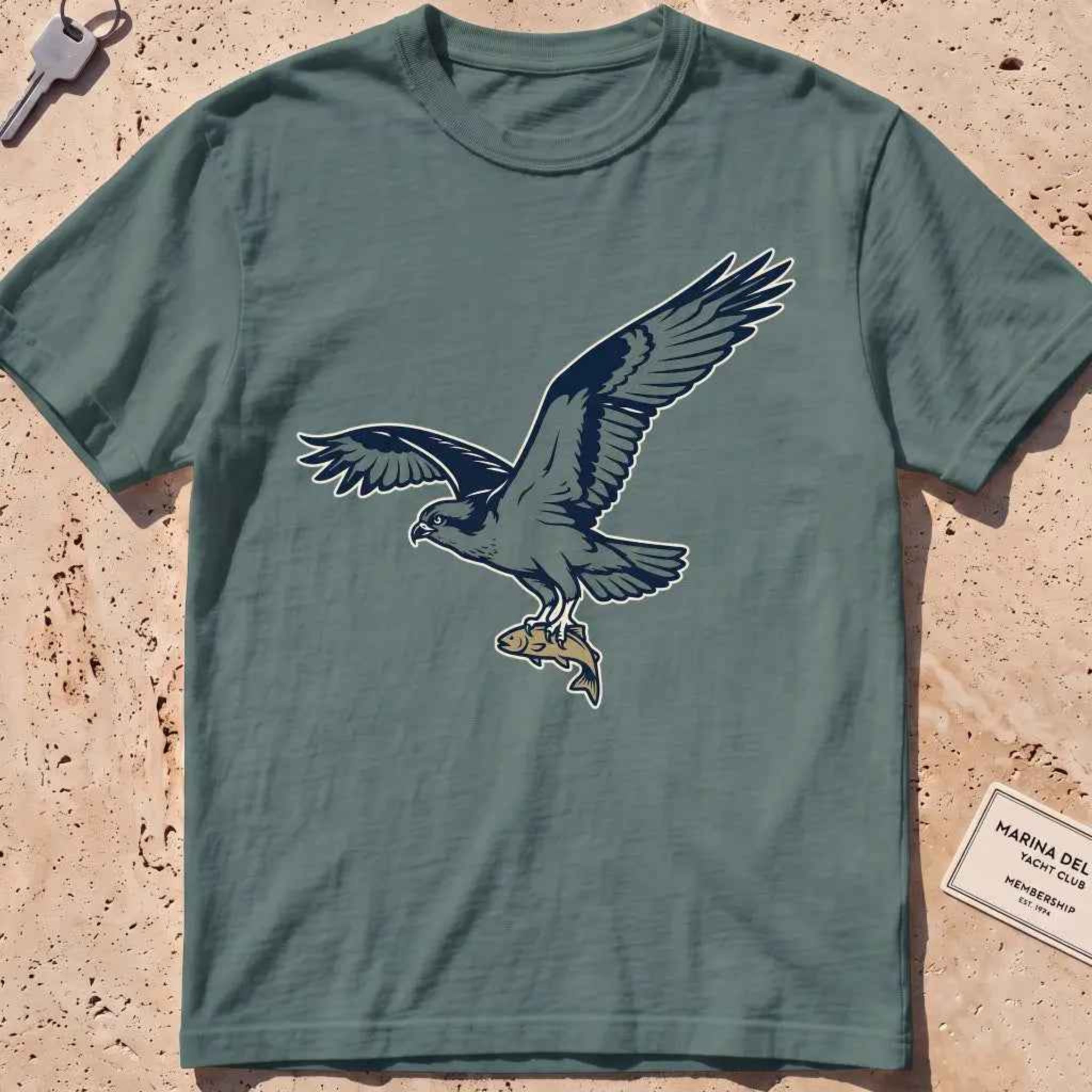 blue spruce heavyweight tee with a bold-fill osprey carrying a fish in its talons graphic.