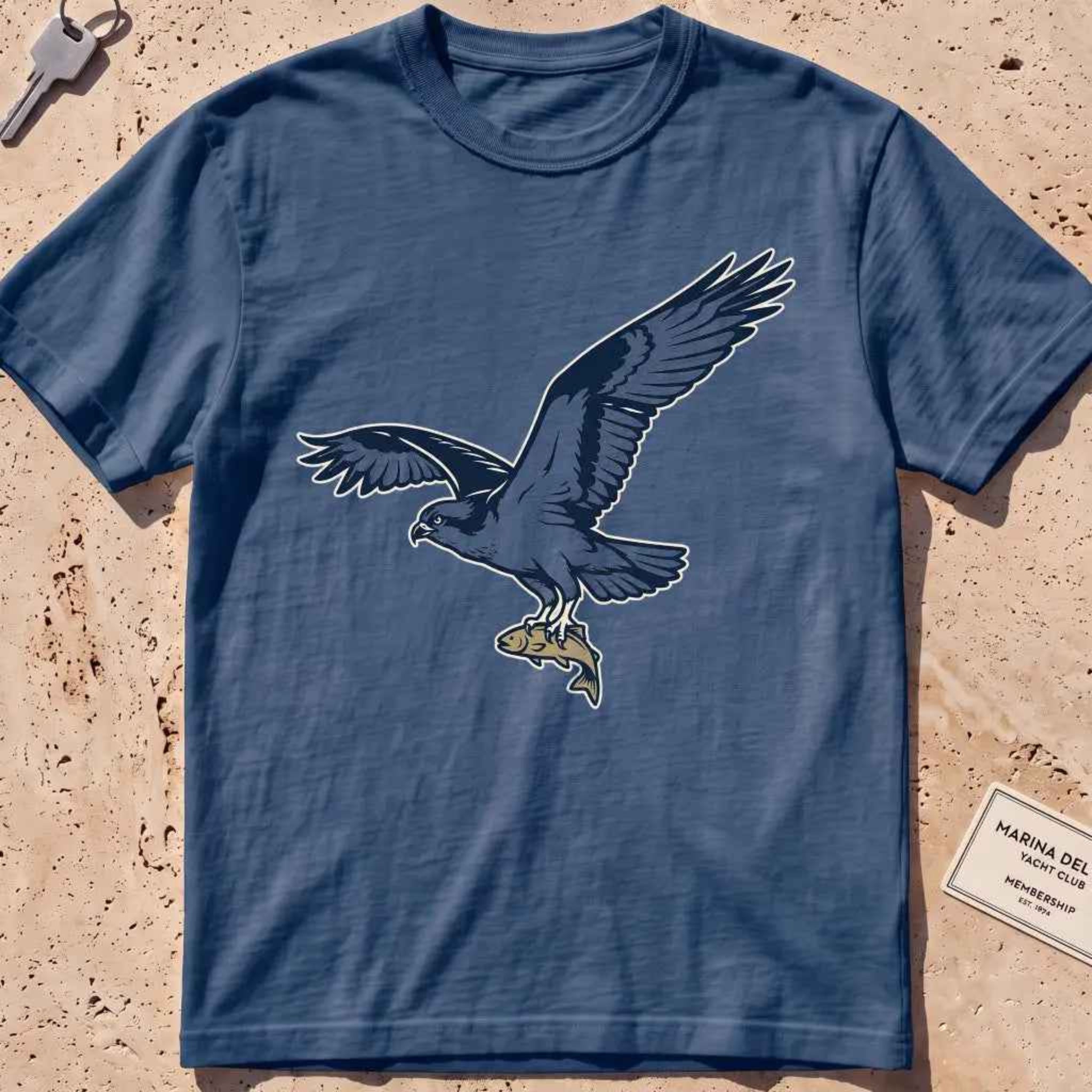 midnight heavyweight tee with a bold-fill osprey carrying a fish in its talons graphic.