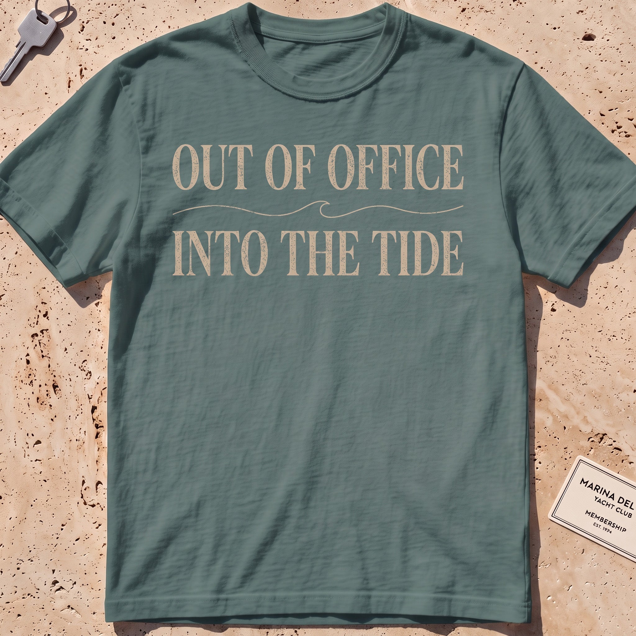 blue spruce heavyweight tee with "Out of Office Into the Tide" type over a wave.