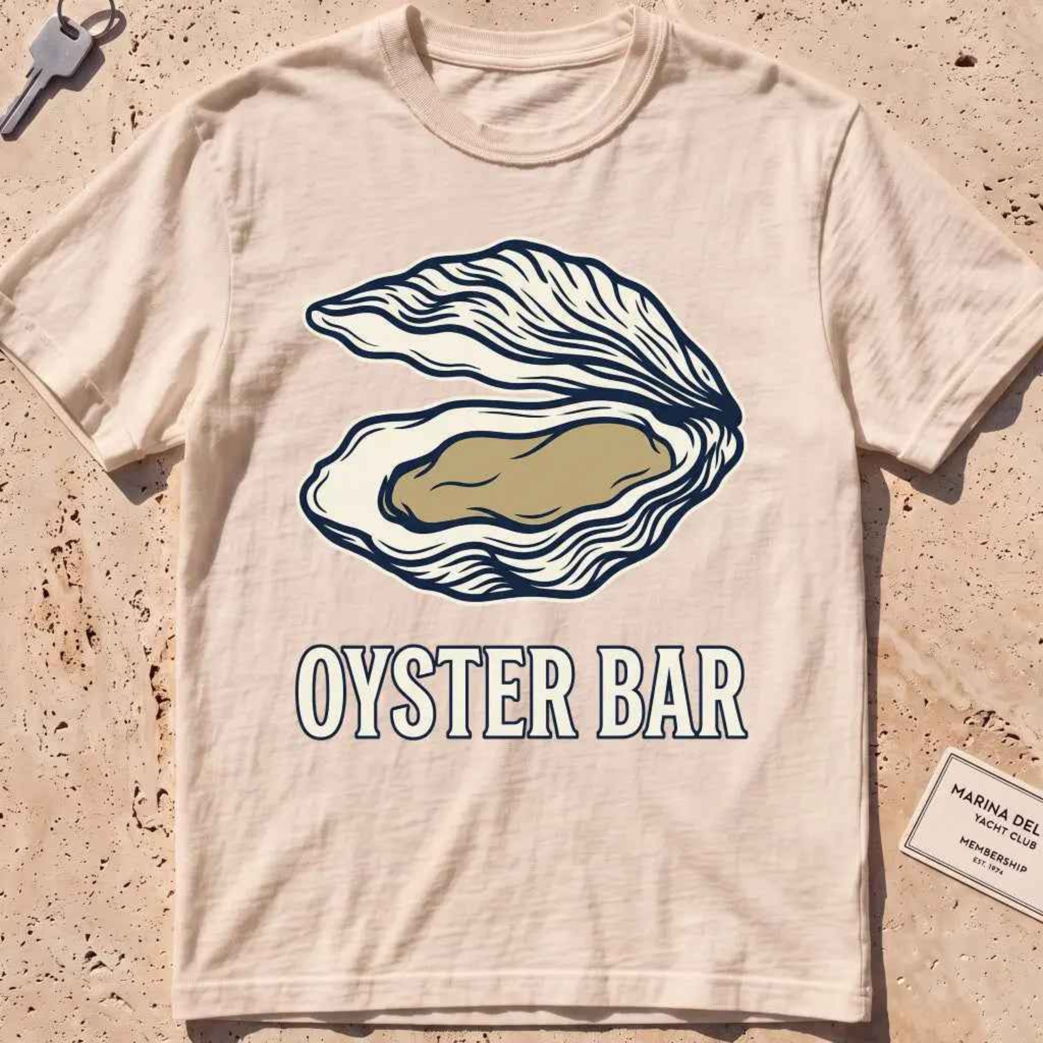 ivory heavyweight tee with a finely engraved oyster shell in vintage line style.