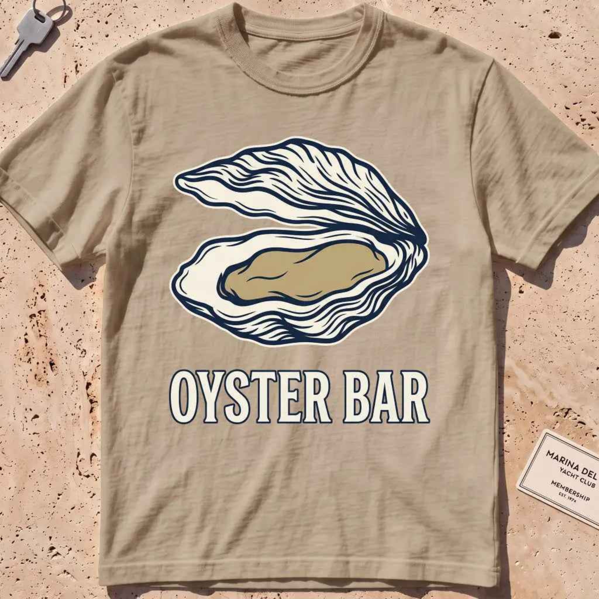 khaki heavyweight tee with a finely engraved oyster shell in vintage line style.