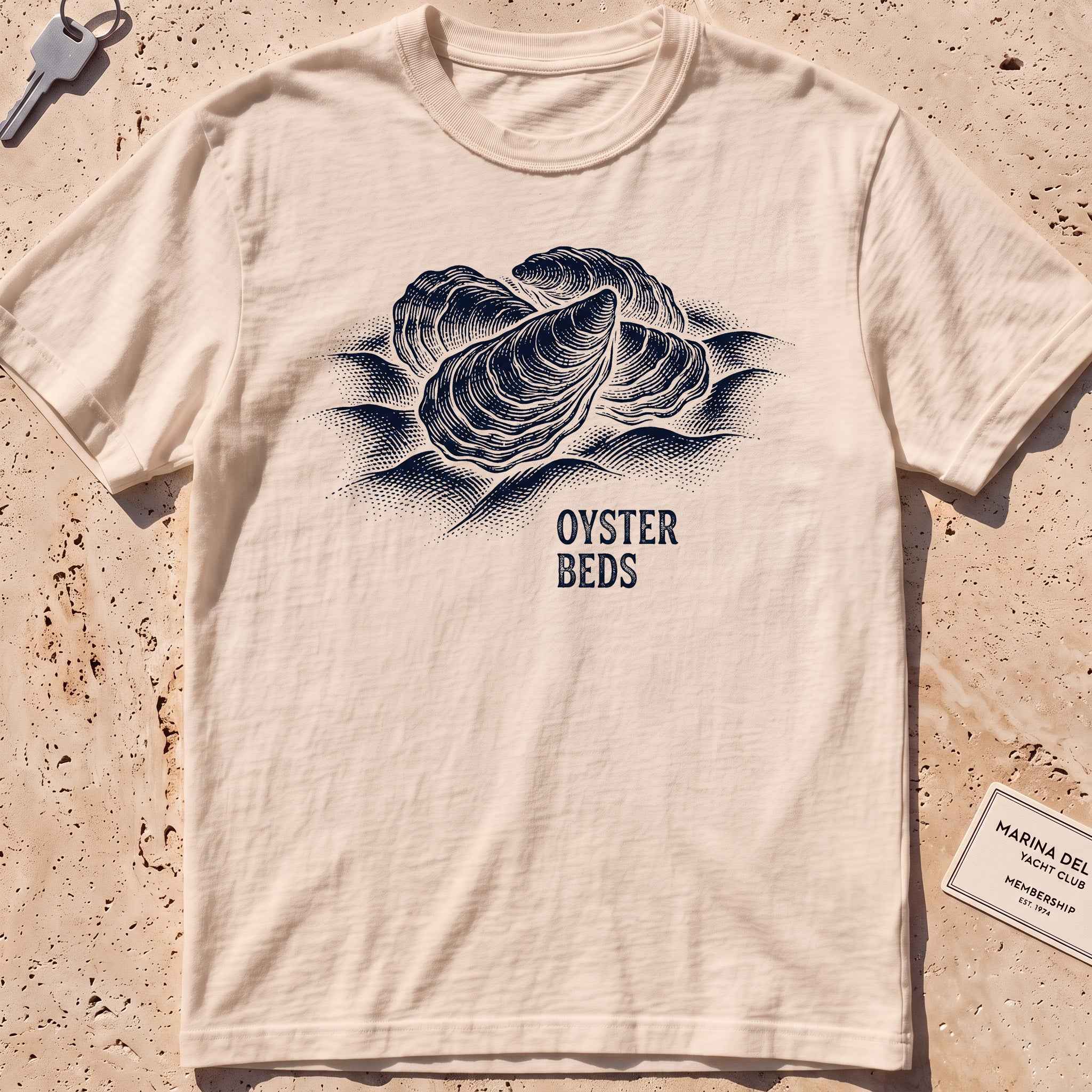 ivory heavyweight tee with an etched cluster of oysters graphic.