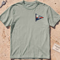 bay heavyweight tee with a sailing burgee pennant crest graphic.