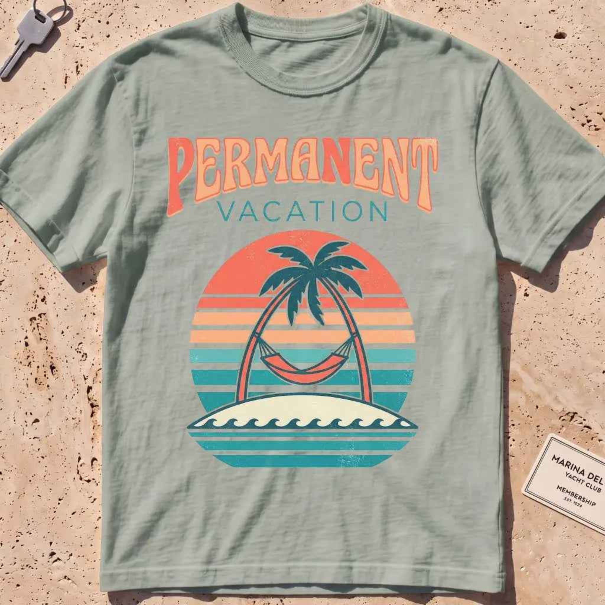 bay heavyweight tee with a retro sunset and hammock "Permanent Vacation" graphic.