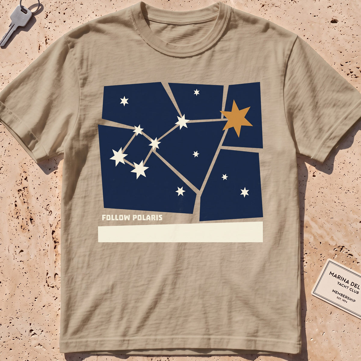khaki heavyweight tee with a Little Dipper "Follow Polaris" graphic.