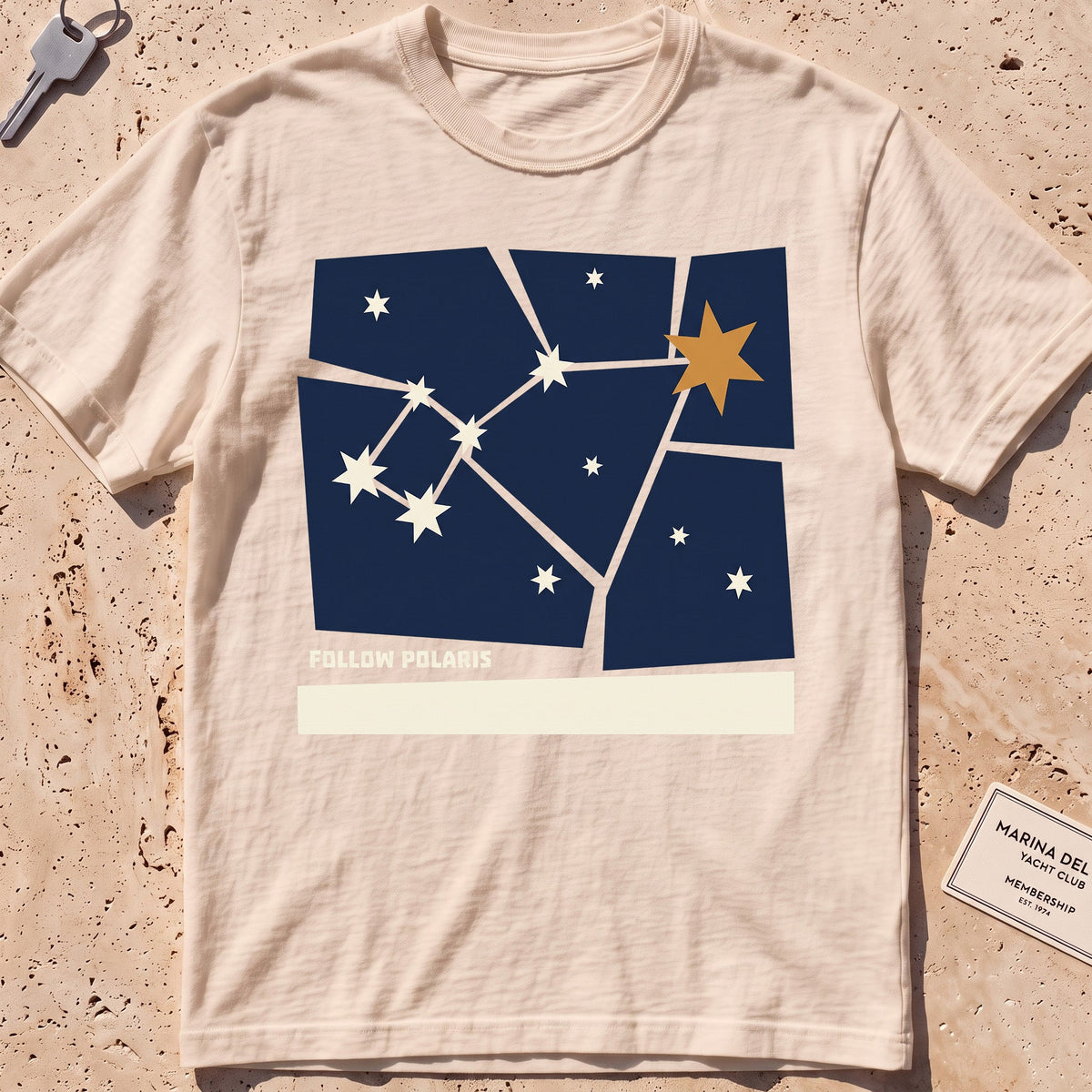ivory heavyweight tee with a Little Dipper "Follow Polaris" graphic.
