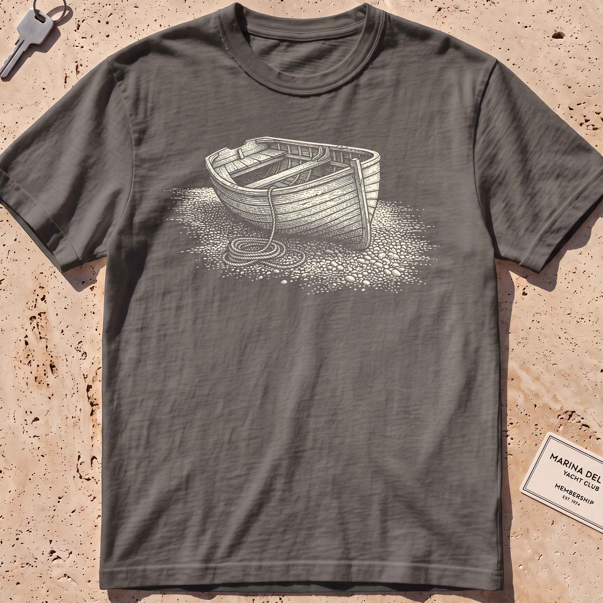 pepper heavyweight tee with an etched dinghy pulled ashore graphic