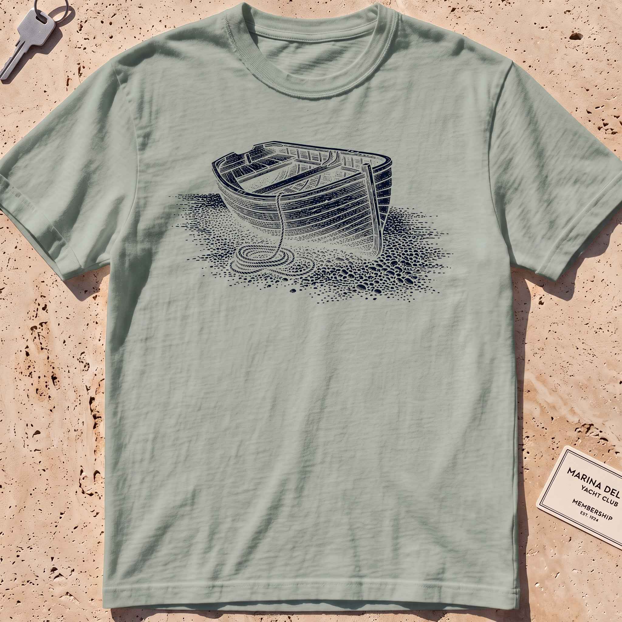 bay heavyweight tee with an etched dinghy pulled ashore graphic
