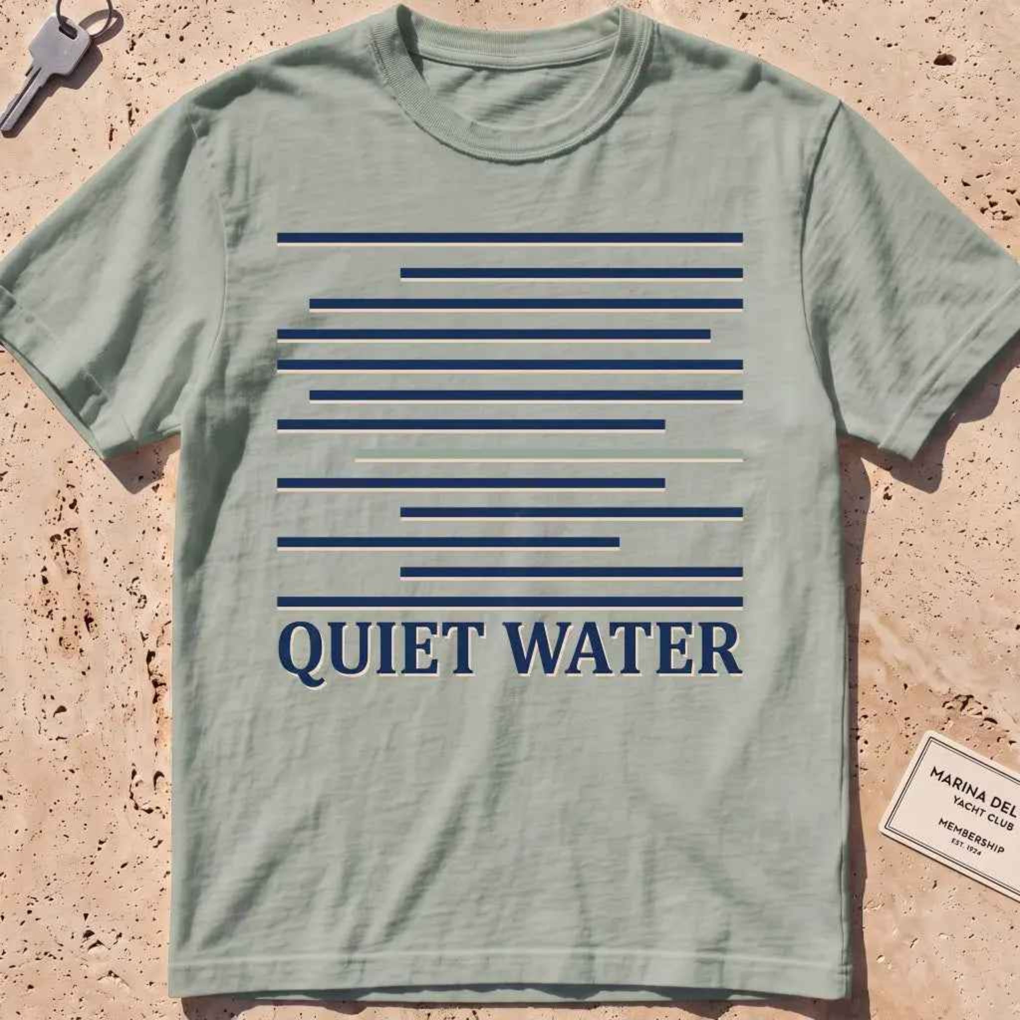 bay heavyweight tee with still-water lines and "Quiet Water" type.