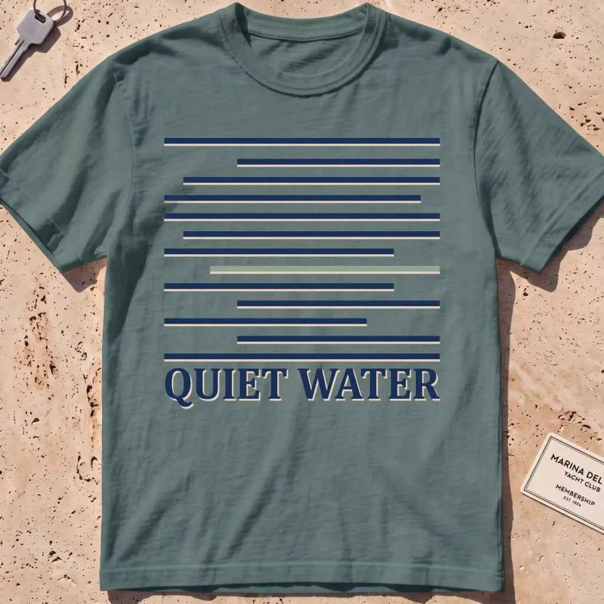blue spruce heavyweight tee with still-water lines and "Quiet Water" type.